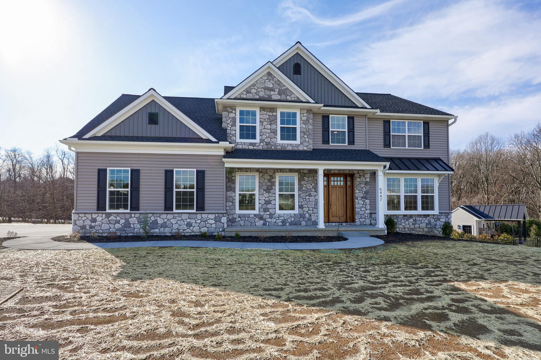 Located in the pristine neighborhood of Old Iron Estates, this newly built home offers a perfect blend of luxury and comfort. The open first floor plan boasts soaring 10-foot ceilings, creating an expansive and airy ambiance. The stunning kitchen serves as the heart of the home, featuring an impressive 8-foot island , perfect for entertaining and culinary creations. The living room is designed for both relaxation and style, showcasing a coffered ceiling, a gas fireplace with stone reaching to the ceiling, and a slate hearth that adds a touch of sophistication. The lower level enhances the home’s potential, with a full daylight basement that includes 10-foot ceilings and rough-in plumbing for a full bath. This space provides endless possibilities for customization, from a recreational retreat to additional living quarters. Schedule your private showing today!