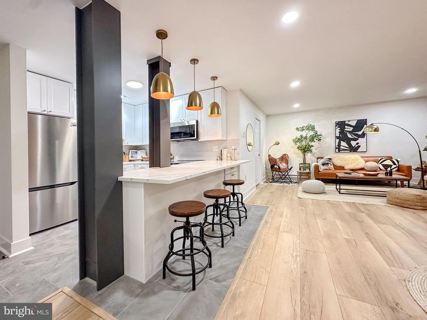 They say I’m the best unit this building has ever seen.
I won’t argue.

Completely reimagined with a contemporary industrial vision — not just fully renovated, but curated. Bold finishes, clean lines, intentional design. You feel the difference the moment you walk in.

The kitchen? Designed to be a true showpiece.
Brand new shaker cabinetry, expansive quartz countertop, Modern Frigidaire Gallery appliances (including a super sleek induction stovetop), Ceramic floors, chic backsplash, exposed metal beams and brick, and modern lighting accents. The oversized island and breakfast nook flow seamlessly toward the expansive balcony through floor-to-ceiling sliding glass doors. Slow mornings, lively evenings — family, friends, everyone’s welcome.

As a rare end unit, I’m flooded with natural light from multiple exposures. New contemporary fixtures and recessed lighting energize your mornings, while subtle LED details set the mood for cozy — even romantic — evenings. All at your fingertips.

The primary bedroom is massive — truly meant for a king...a king bed :) plus plenty of space for a sitting area. The second bedroom easily transforms into an office, studio, or private gym.

The fully renovated bathroom adapts to your mood: bright spotlight mode for mornings, soft dual LED glow for relaxed evenings.

High-end ceramic welcomes you at the entry, LPV elevates the living areas, plush carpet softens the bedrooms. New AC, New Heating, New plumbing, New electrical…you get the picture, everything’s new.

Storage? Exceptional.
A generous entry storage area, two additional closets, a pantry with an optimized pocket door, and a double-sized walk-in closet in the primary bedroom — so spacious it feels boutique.

Minutes to D.C., multiple Metro stations, major highways, Reagan National Airport — plus Barcroft Lake and major shopping nearby. This is commuter convenience with lifestyle built in.

Snow is melting. Summer is peeking through the glass. The pool, tennis courts, and community amenities are ready.

They call me a rare opportunity — a keeper.
I simply call it exceptional.

Shall we meet?