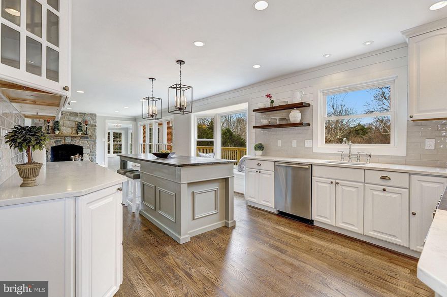 BEAUTIFULLY RENOVATED HOME ON JUST UNDER 3 ACRES , FEATURING A FABULOUS LIGHT FILLED OPEN FLOOR PLAN FOR ENTERTAINING & A RELAXED LIFESTYLE. APPROXIMATELY 6000 SFT FINISHED SPACE WITH AN AMAZING CENTER ISLAND KITCHEN W/QUARTZ COUNTERTOPS, SHIPLAP, CHEF S RANGE, POT FILLER. A MUST SEE BARN DOOR MASTERBATH. NEW HARDWOODS, NEW DECK, NEW PATIO. IT S ALL NEW BUT AMAZINGLY WARM & INVITING!