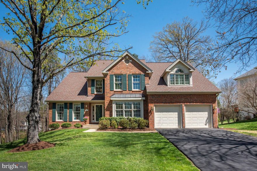 Nestled on a premium .35-acre cul-de-sac lot in sought after Virginia Run this 5 bedroom, 3.5 bath colonial delivers an excellent location, plenty of living space on 3 levels, and with an abundance of windows unites indoor and outdoor living with effortless harmony. The beauty begins outside with a tailored brick facade with covered entrance, 2 car garage, beautiful landscaping, oversized sundeck, encircled by majestic trees. 

Inside, an open floor plan, high ceilings, decorative moldings, custom built-ins, PLUS a spectacular 3 LEVEL BUMPOUT with sunroom, sitting room, and lower level bedroom are just a few features that make this home so special. All the big renovations are done, kitchen and baths! Make it move-in ready! 

Gleaming hardwood floors greet you in the foyer that flow into the library on the right with custom built-ins that makes an excellent home office. Opposite, the formal living room features warm neutral paint. The formal dining room offers space for all occasions with crown molding, chair railing and is accented by a large bay window. 

The gourmet kitchen is sure to please the modern chef with gleaming granite countertops, an abundance of 42” cherry cabinetry, and quality stainless steel appliances large center island with downdraft cooktop provides additional working surface, a wall of windows overlooks the backyard, and earth toned Italian tile floors flow into the breakfast area that is ideal for daily dining. The family room invites you to relax in front of a cozy brick wood burning fireplace.  Adjacent sunroom gives a view of trees and a peek at the pond in the winter. The French style door opens to the deck with new floor and lush fenced yard sprinkled with mature trees—seamlessly blending indoor/outdoor living. An updated powder room and laundry room round out the main level. 

Upper Level, the gracious owner’s suite boasts  spectacular separate sitting room with walls of windows. The ensuite bath features a dual sink vanity private water area, and sumptuous jetted tub, and a glass enclosed shower with custom decorative tile. Down the hall, three additional bright and cheerful bedrooms share easy access to the beautifully updated hall bath with dual sink vanity. 

Lower Level with approximately 1000 square feet has plenty of versatile space for a multitude of activities, exercise, den, recreation area PLUS a bedroom, full bath and lots of storage space. 

Roof 2017, HVAC 2012 & 2009, Hot Water Heater 2018, Windows 2015 & 2004

This home sits in a quiet and peaceful setting and yet it’s only a stone’s throw away from I-66, Routes 29 and 28, and diverse shopping and entertainment choices. Take advantage of fabulous neighborhood amenities including an Olympic size outdoor swimming pool, club house, nature trails, tennis courts, tot lots, and so much more. Outdoor enthusiasts will love the many local parks including the pristine rambling acres of Cub Run Stream Valley Park, History buffs can explore the multitude of historical sites, and golfers can hit the links at several fine area courses. It’s the perfect home in a sensational location!