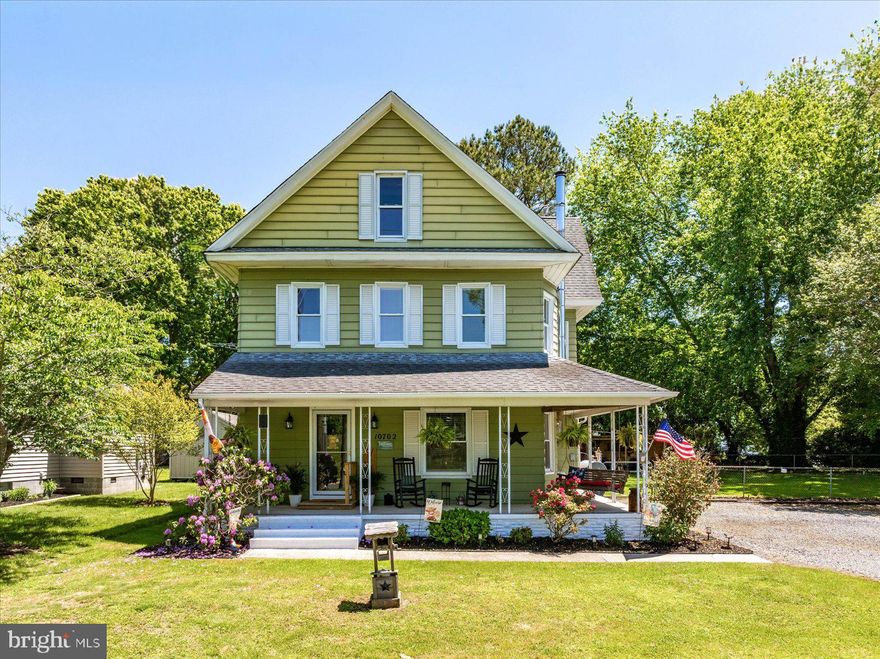 Just minutes from the beaches, restaurants, and excitement of Ocean City, this charming farmhouse-style home in Bishopville offers the perfect balance of convenience and peaceful country living. Relax on the front porch swing while enjoying breathtaking sunsets and the beautiful surroundings that make this property feel like a private retreat.
This beautifully updated home features 4 spacious bedrooms, including a convenient first-floor bedroom, and 2 fully remodeled bathrooms. The luxurious Primary Suite includes an oversized walk-in closet/dressing room that feels like a boutique space of its own. Throughout the home, you'll find stunning custom details including wood-paneled ceilings, shiplap walls, designer trim work, and warm finishes that create a cozy yet elevated feel.
The first floor welcomes you with a spacious entry area leading into a comfortable family room with a wall-mounted electric fireplace, or into the inviting living and dining area centered around a wood stove that efficiently heats the home during the winter months. The show-stopping kitchen is truly a dream for any cook, featuring a long granite peninsula with seating for six, custom cabinetry, black stainless steel appliances, glass tile backsplash, and beautiful shiplap accents.
Also on the main level is a gorgeous full bathroom with a walk-in tiled shower, along with a spacious mudroom/laundry area complete with pantry storage, an additional refrigerator, and a separate freezer for extra convenience.
Step outside to an incredible covered back deck designed for relaxing, grilling, and entertaining. The large fenced backyard offers privacy and space for pets, play, gatherings around the fire pit, or simply enjoying the shade and serenity of your own outdoor oasis.
A standout feature of this property is the impressive detached outbuilding. The first floor serves as a functional workshop with ample workspace, while the upstairs offers a climate-controlled finished area perfect for a home office, art studio, yoga room, gym, or playroom. It even includes a kitchenette area for added comfort and flexibility.
Additional highlights include abundant closet space, a full walk-up attic with endless storage potential or future finishing possibilities, and a basement housing major system upgrades including:
High-efficiency oil furnace (2021)
Water heater (2020)
Owned water softening system (2024)
The home also includes seven high-efficiency mini-split heat pumps providing heating and air conditioning throughout, with the wood stove and oil furnace serving as supplemental heat sources. Recent updates include fresh paint throughout, new carpet upstairs, and new luxury vinyl plank flooring on the main level.
Every inch of this home reflects thoughtful design, comfort, and character. Properties like this rarely come available — schedule your showing before it’s gone.
