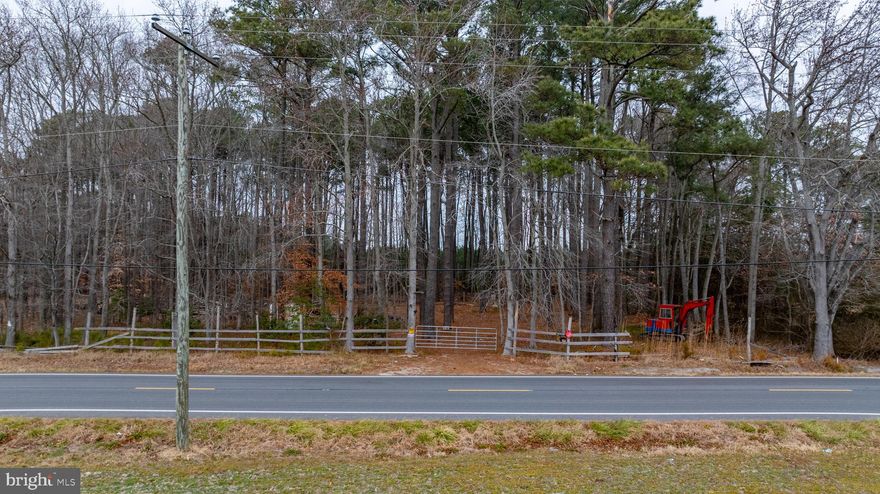 2.5 acre wooded Lot in a peaceful, desirable area of Westover. Public sewer available; private well not yet applied for.  Enjoy a quiet rural setting while being close to outdoor activities such as fishing and boating. Just a short drive to Crisfield and approximately 40 minutes to Ocean City beaches. This is an ideal location to build your dream home or a private get-a-way.

Buyer to verify well permit, zoning, land use, utilities, and flood insurance requirements.