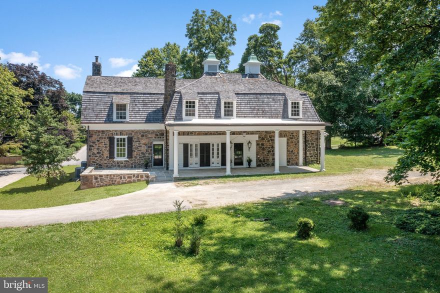 *** 7/10 Open House Cancelled Stunning Totally Renovated Stone Carriage Home set on a level 1 acre lot in Devon!  All the charm and character of an older home but with fully updated interior and systems! A Grand flagstone Veranda welcomes you to this special home with high end kitchen, luxurious primary suite, great open floor plan, lavish light fixtures and finishes, and impressive attention to detail. The open floor plan features a Sun filled Great Room with Original Marble fireplace, open to a gorgeous kitchen with custom cabinetry and breakfast room. The kitchen is a chef’s delight featuring a large seated island, gas six burner range with quartz full slab backsplash and pot filler, subzero refrigerator, GE Monogram 6 burner cooktop, microwave drawer, farm sink, quartz counters, subway tile backsplash, walk in pantry and a wet bar area!  The dining space adjacent to the great room has decorative moldings and french doors to the patio that allows for effortless indoor outdoor dining. A den/office with built-in bookshelves and pocket doors is the perfect area to work from home!  The cozy family room has original exposed stone walls, a gas fireplace with marble surround, stunning arched windows and skylights making it a cozy spot for movie night or a good book. A built-in vintage bench is conveniently located by the back door and a mud room/ storage room!  A powder room with pedestal sink completes the main floor.  The primary suite is a true retreat with cathedral ceilings, two walk-in closets - each custom outfitted with plenty of storage and a spa-like primary bathroom with a marble tiled shower w/ frameless glass doors, free standing soaking tub and double vanity with Carrera marble counters. Four additional bedrooms all feature custom closets and share two full bathrooms, each meticulously renovated to adhere to the age and feel of the home. A full size laundry room and linen closet complete the second level. With new dual zone HVAC, new cedar shake roof, and all new electrical and plumbing, this home is worry free!  All of this is located on a spacious level lot, in the heart of Devon & award -winning Tredyffrin School District, convenient to Devon Yard, the Horse Show, Devon train station, Whole Foods, Devon Elementary School, and all the Main Line has to offer!