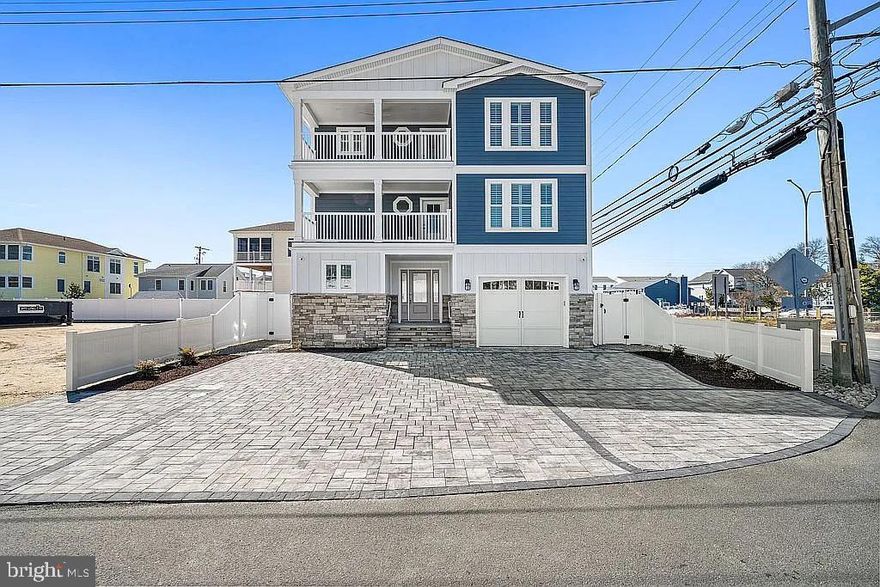 Rare North End Ocean-View Retreat | 5BR Luxury Home with Pool, Elevator, Garage & Off Street Parking Welcome to one of the most exceptional offerings on the north end of Dewey Beach, where modern coastal luxury meets a truly rare combination of ocean views, iconic and one-of-a-kind sightlines down the Dewey strip, and the convenience of paved off-street parking spaces. This newly constructed, fully furnished 5-bedroom, 4 full bathroom (and 2 half bath), 4,155 square-foot residence is thoughtfully designed across three expansive levels, all easily accessed by a private elevator. From the moment you arrive, the home sets itself apart with its scale, craftsmanship, and turnkey convenience. The heart of the home is an open-concept living space designed to maximize natural light and capture sweeping views. Expansive windows and multiple outdoor decks create a seamless indoor-outdoor experience, while high-end finishes and curated furnishings elevate every detail. Step outside to your private pool and custom-built pool bar, complete with dedicated seating and service area, creating the ultimate setting for entertaining. Whether hosting summer gatherings or unwinding after a day at the beach, this outdoor space delivers a true resort-style experience rarely found in Dewey Beach. What truly distinguishes this property is its unique vantage point. Enjoy not only ocean views, but a rare, unobstructed perspective down the Dewey Beach strip, an irreplaceable feature that delivers both energy and exclusivity. Combined with the quiet appeal of the north end location, this home also offers easy access to the town. Additional highlights include: • Five spacious bedrooms ideal for hosting large groups • Private elevator servicing all three floors • Multiple decks capturing ocean breezes and panoramic views • Off-street parking spaces, an exceptional amenity in Dewey Beach • Private garage offering additional storage and convenience • Fully furnished and professionally designed for a true turnkey experience Whether you’re seeking a premier personal retreat or property to lease, this home offers outstanding leasing potential while delivering a luxury lifestyle that is simply unmatched in Dewey Beach. This is a rare opportunity to own a standout property in one of the East Coast’s great beach communities, where location, views, and livability converge.