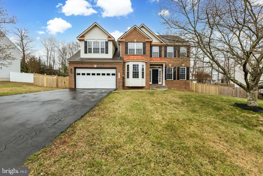 Welcome to this beautifully updated home in the heart of Woodbridge, offering spacious living across three levels with modern upgrades throughout. Recent updates include new carpet, stylish flooring, fresh paint, sleek new kitchen countertops, and updated appliances, making this home move-in ready! The main level features a well-designed layout with a formal dining area, living room, private study/office, cozy family room, kitchen, and convenient laundry. Upstairs, you'll find four generously sized bedrooms and two full bathrooms, providing plenty of space for family and guests. The lower level offers even more versatility with a large additional family room, a full bathroom, and abundant storage space. Step outside to a beautiful backyard with endless possibilities—perfect for entertaining, gardening, or relaxing. Nestled in an amazing location just minutes from major highways, shopping malls, restaurants, and entertainment, this home offers the perfect blend of comfort and convenience—all at a fantastic price! Don’t miss this incredible opportunity!