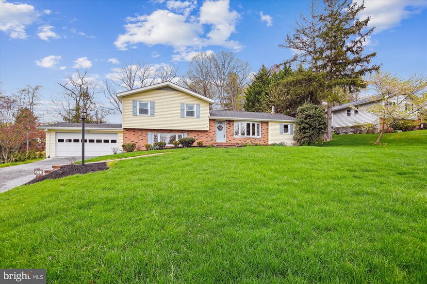 <b> OFFER DEADLINE - SUNDAY, APRIL 20TH at 8:00 PM.</b><br><br>

Sited on a gorgeous half acre lot in sought after Dunloggin, this Split Level home is meticulously well-maintained, showing pride of ownership throughout. The main level features a spacious living room highlighted by an eye-catching front bay window and a corner wood burning fireplace with raised hearth. Both the living and dining rooms have hardwood flooring beneath the neutral carpeting. The dining room is generously sized with abundant room for entertaining, and connects to the renovated kitchen with Quartz counters, upgraded ceramic tile flooring, and door to the composite rear deck for easy outdoor dining. The upper level provides three generously sized bedrooms all with gleaming hardwood floors, as well as two full bathrooms that have been beautifully renovated from top to bottom. Both bathrooms exemplify quality workmanship with high end finishes, including modern vanities and gorgeous custom tilework. The lower level provides a comfortable family room with built-in shelving and cabinetry, as well as an impressive coffered ceiling with recessed lights. Also on this level is a hobby room/office, sitting area with door to rear yard, powder room, separate laundry room, and a mudroom that connects to the large attached garage with room for 2 cars plus additional storage space. The exterior is equally special with an expansive half acre lot complemented by beautiful landscaping, mature trees, and a charming front walk. All this, and a new roof with architectural shingles in 2019 and a new furnace in 2022.