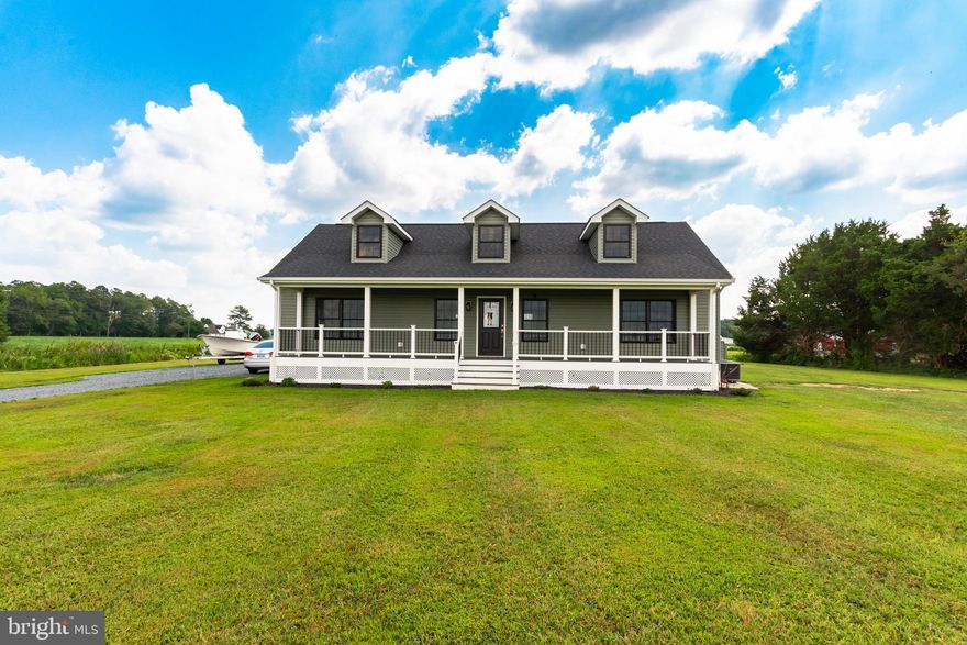 Welcome to this custom built 1 year young home. This home was built with care and pride. It features 2"x6" framing, energy efficient windows, heat pump with gas back-up and tankless water heater. The covered front porch (45'x6') invites you to enter this open floor plan with life proof luxury vinyl plank flooring.  The kitchen is open and airy with white  36 inch cabinets, quartz countertops, large center island plus under cabinet lights. All GE appliances with gas stove. The sliding glass door off the dining area leads to large composite deck (25'x16'). The primary suite features walk-in closet and primary bath with double vanity, stall shower and separate shower/tub. 
Bring your horses and settle right in with fenced pastures, 2 run-in sheds and machine shed with concrete floor plus irrigation spigots run from home well.
Total property taxes for house and 2 lots $3121.33/year
Easy commute to  NASA and Salisbury!
