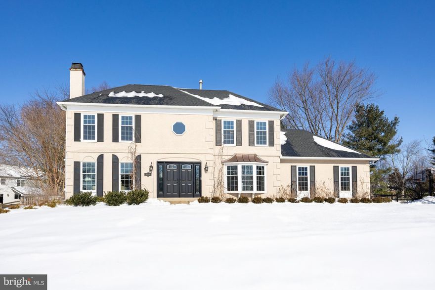 Welcome to this lovingly maintained and updated colonial located in the highly sought-after Yardley Crest community. Set against mature landscaping and offering exceptional indoor and outdoor living spaces, this four-bedroom, three and a half bath home blends classic architecture with modern improvements. Upon entering, a grand two-story foyer with refinished hardwood floors and a turned staircase sets the tone. The formal living room has a gas fireplace with a craftsman-style mantel, while the dining room across the foyer offers an elegant space to gather with family or friends. The kitchen opens to the casual dining area, where a vaulted ceiling, skylights, and a wall of windows frame backyard views. Recent upgrades include new kitchen flooring and newer appliances, including a dishwasher, built-in microwave, and range/oven. Quartz countertops, raised-panel cabinetry, stainless steel appliances, tiled backsplash, and a walk-in pantry provide both style and functionality. The kitchen opens to the family room, offering another inviting gathering space, with a second gas fireplace, window seat, and abundant natural light. Just off the kitchen, the three-season sunroom offers tranquil green views of the fully-fenced back yard. A flex-room/office space and laundry room complete the main floor, both conveniently located off of the kitchen, also with access to the attached, two-car garage. Upstairs, the spacious primary suite offers a large walk-in closet and a well-appointed bath with dual vanities, separate bathtub, glass-enclosed shower, skylight, and windows offering lots of natural light. On this floor, three additional bedrooms feature oversized closets with custom organization. These rooms share a recently renovated hall-bathroom with double-vanity. Downstairs, the finished lower level has a large recreation area, a full bathroom, and two additional bonus rooms, offering flexibility for a potential guest bedroom, office, playroom, or hobby space. Notable home improvements include a new roof, skylights, and windows (2023), basement waterproofing (2024), all five exterior doors replaced (2025), a whole-house generator (2022), refinished hardwood floors throughout and new kitchen flooring (2019), renovated main-level powder room and upstairs hall bath (2019), and stucco repairs completed in 2019 and 2025. (Please see full list of improvements provided in additional documentation.) This meticulously maintained home offers space, comfort, and peace of mind in one of Yardley’s most desirable neighborhoods. ***Floor plans coming***