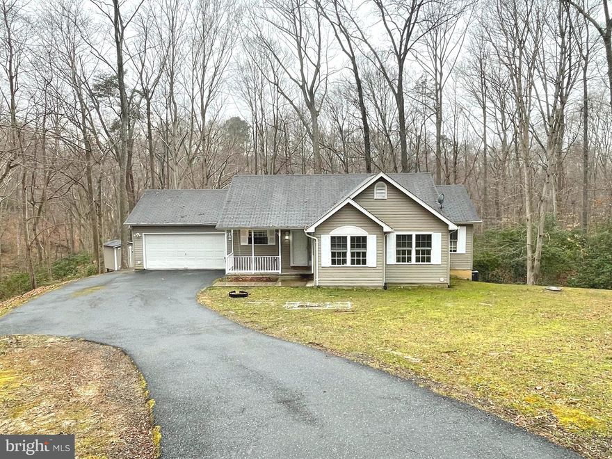 3 bedroom 2 bath rambler on no through street surrounded by wooded privacy.  Open floor plan.  Primary bedroom with full bath and walk-in closet.   Unfinished walk-out basement.  Two car front load  garage with automatic garage door.  Rear deck, storage shed and fenced rear yard.  Paved driveway.  Pets case-by-case basis.