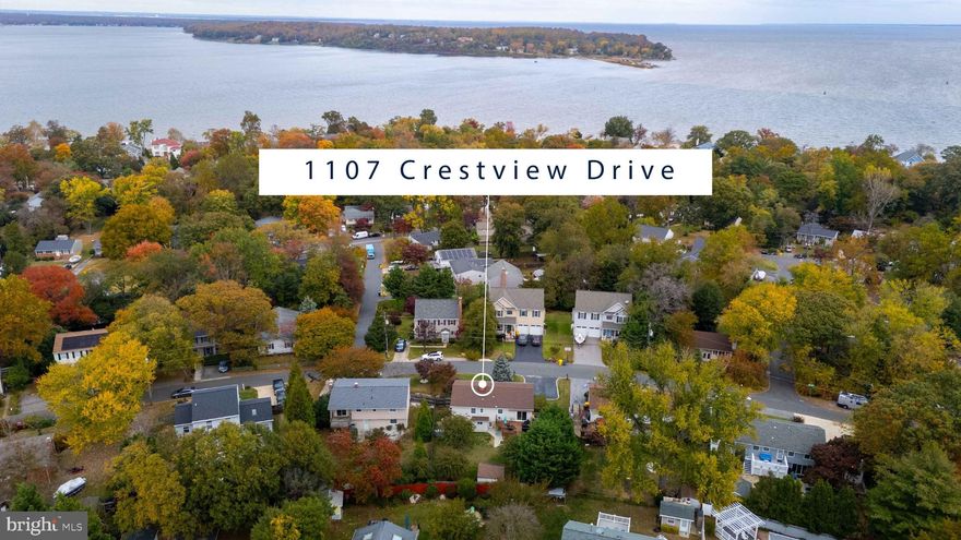 Located in the highly sought-after Cape St. Claire neighborhood — where life unfolds against a backdrop of sandy beaches and boat slips — this thoughtfully maintained split-foyer home offers comfort, flexibility and peace of mind.
The main level features an easy, functional layout highlighted by an updated custom kitchen and a dining area that opens to a newer Trex deck with awning — ideal for shaded summer dinners or quiet mornings with coffee. Steps lead down to the privacy-fenced backyard, where a storage shed adds everyday practicality. The living room is filled with natural light, anchored by an expansive window that brightens the space throughout the day.
The primary bedroom with en suite bath and a generously sized second bedroom are positioned on the upper level, along with a full hall bath, creating a comfortable retreat.
Downstairs, the finished lower level expands your living options. A spacious gathering room with propane gas fireplace provides a cozy setting for movie or game nights, while two additional bedrooms offer versatility for guests, home offices or flex space. A large unfinished utility area with washer and dryer allows for abundant storage and room for hobbies or workshop needs.
Meticulously cared for, the home reflects thoughtful stewardship throughout, including: 2018 waterproofing, a whole-house generator, owned well water treatment system with reverse osmosis in the kitchen, newer well pump, annual termite warranty and a standing quarterly gutter-cleaning contract. The exterior, shed and deck were professionally power-washed in September 2025. 
Life in Cape St. Claire means access to three beaches, three marinas, a fishing pier, boat ramp and kayak storage. Optional membership to the Cape St. Claire Swim Club — home of the Dolphins’ competitive swim team — offers even more community connection. Located within the award-winning Broadneck School District and convenient to downtown Annapolis, with easy access to commuter routes to Washington, D.C., Baltimore and Fort Meade, this home offers the rare combination of neighborhood charm, waterfront lifestyle and commuter convenience.