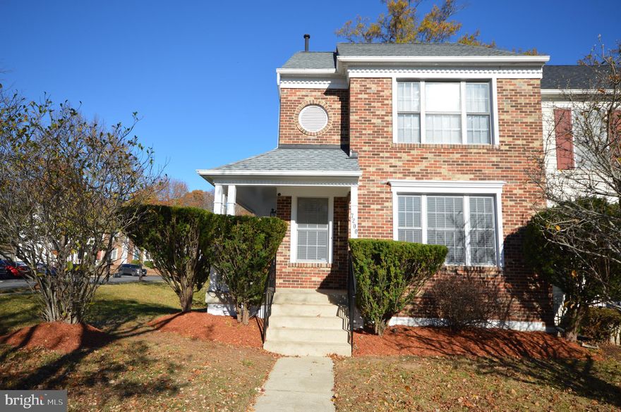 Honey, stop the car!  Modern, Natural Light & Spacious! This over 2000 square foot 3 bedroom (with an opportunity for a 4th bedroom on the lower level) 2 1/2 bath beauty located in the sought-after Summit Creek Community truly shows pride of ownership.  This spectacular end unit features a stately brick facade with a porch front nestled behind a meticulously manicured shrubbery accented by vibrant red mulch. Walk around the porch where the entrance awaits your access to a beautiful sunlit foyer and living room on the main level adorned with fresh paint, new carpet, plantation blinds, modern features and hardwood flooring.  Just to your left, is a relaxing powder room with a decorative oculus  window that will delight your guest.  Did I mention that the entire kitchen has been remodeled, perfect for entertaining, cooking gourmet meals, and storing your goods in an ample pantry space next to a separate dining room with hardwood floors and a bump-out if you desire a deck? The home is equipped with new modern hardware and handles on the doors, not to mention recessed lights. That's just the beginning! Venture up the carpeted open stairways where your majestic primary bedroom has a spacious closet, the perfect spa bathroom with jet tub, Calacatta marble floors, a beautiful separate glass door shower and two additional bedrooms. Each floor is equipped with sprinkler systems to keep your family safe in case of an emergency. Lets head down to the basement! There is an additional finished room with a large closet that can be used as a 4th bedroom.  How about a nice warm shower in a full bathroom with a stand-up shower trimmed in gold. There's more space to enjoy in the serene family room featuring a fireplace, custom built-in  bookshelf, space for storage, and the convenience of having a washer and dryer with a utility sink.  The HOA amenities features: a walking trail, clubhouse, swimming pool, tennis court, playground and two assigned parking spaces right in front of the house. Now how awesome is that? The property is conveniently located 20 minutes from Washington, DC and its attractions. The MedStar hospital is less than a mile away.