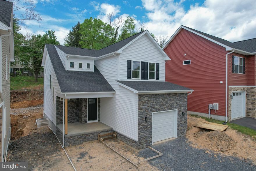 Spring 2026 Delivery! 3 bed, 2.5 bath new construction home with an unfinished basement, attached garage, and front and back porches! Walking in the front door, you will have a convenient coat closet and half bath in the foyer. The kitchen opens to the breakfast /dining area, which flows to the living room. The home is finished with luxury vinyl plank flooring on the main level, stainless steel appliances, upgraded countertops, and convenient upstairs laundry room by all 3 bedrooms. The primary suite features a walk in closet and tiled shower. There's a tiled shower in hallway bathroom as well. Fully carpeted in bedrooms, landings and hallways are luxury vinyl plank. Desk space in lofted hallway. Public water and sewer, paved road, private driveway, exterior lighting, and sidewalk to your front door. Make brand new home ownership a reality!