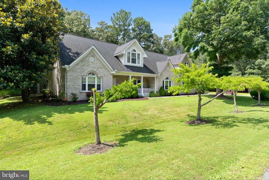 Dont miss this out on this beautiful home!!!!
Welcome to 14895 Ethan Dr., a huge five-bedroom, five-bath home located in the highly sought after waterfront community of Swan Point. This all-brick, contemporary masterpiece has been thoughtfully designed and built, featuring luxurious extras and upgrades that enhance everyday living.

***Note - New roof, new HVAC systems, new hot water heater. 5,5" gutters, with gutter guards, that tie in underground and dump into the culvert.  All replaced in 2023!!!!.  Also all of your floors are heated!

Step inside to discover soaring 10-foot ceilings and heated floors throughout the main level, creating an inviting atmosphere. The expansive kitchen boasts 42" custom cabinetry with in-cabinet and under-cabinet lighting, along with elegant granite countertops—perfect for culinary enthusiasts and entertaining guests. The tile flooring adds sophistication, complemented by crown and chair molding throughout.

Don’t miss the secret storage/panic/safe room in the laundry area for added peace of mind. This home features a main floor primary suite and an additional guest room with a full bathroom on the main level. The office includes an attached half bathroom and access to the  large back patio. The living area showcases a charming brick fireplace, serving as a cozy focal point and a built in wet bar for entertaining. Each bedroom is equipped with spacious walk-in closets, providing ample storage, while every bathtub features jets for a soothing retreat.

Enjoy outdoor living on the expansive concrete patio, ideal for BBQs, gatherings, or quiet evenings. The conditioned garage ensures comfort in any season, with unique features including a hot water hose bib for vehicle washing, even in winter, and professionally landscaped grounds that enhance curb appeal.

Located in this waterfront community, this resort-style community offers an array of amenities: a waterfront pool with a pool house, the Osprey Boat Bar for casual weekend nights, a sandy picnic area overlooking the Potomac River, a championship 18-hole golf course with a putting green and driving range, tennis and pickleball courts, and walking/biking trails. The Country Club's restaurant provides a delightful dining experience for those nights when you prefer not to cook, along with planned events like wine tastings, painting parties, murder mystery dinners, Sunday brunches, and the Summer Concert Series on the veranda.
Experience resort living at its finest!

***Note that these big ticket items were all replaced in 2023:  New roof, new HVAC systems, new hot water heater. 5,5" gutters, with gutter guards, that tie in underground and dump into the culvert.  Also all floors on main level are heated!