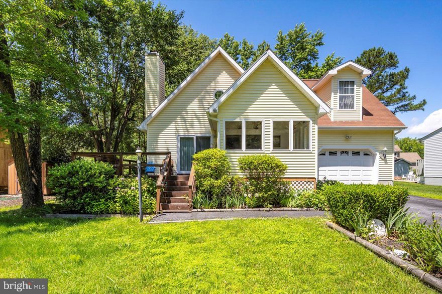 Charming 4 bedroom, 2 bath home nestled in the heart of Ocean Pines! This custom built home features an inviting open floor plan, cathedral ceilings, stainless steel appliances, granite countertops, remodeled downstairs bathroom and kitchen, a sunroom, a pellet stove, and TWO FIRST FLOOR bedrooms! The two upstairs bedrooms and the loft offer plenty of privacy. There's also a paved driveway, an oversized one car attached garage, a deck, and a large back yard with lots of possibility. The crawl space is encapsulated and insulated! Built on a cul-de-sac tucked into north Ocean Pines, you'll have both peace and quiet and access to all the amenities Ocean Pines has to offer. Truly the best of both worlds! Schedule your showing today!