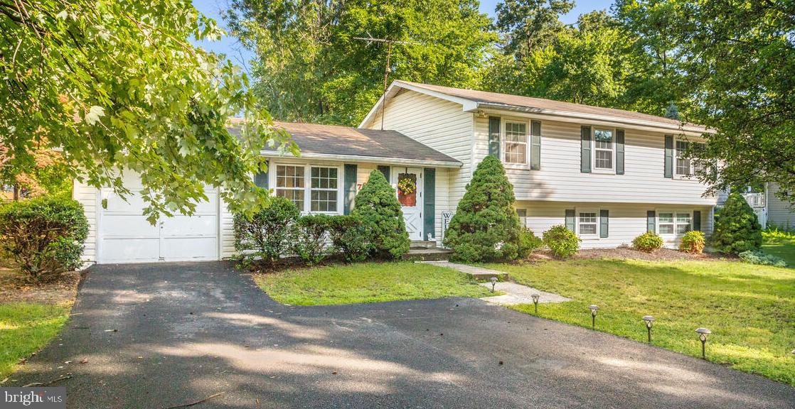 Beautiful Home on Large Corner Lot with lots of Space. Enjoy the Summer with your very own Amazing Inground Pool. POOL IN PROCESS of being Cleaned. Large Kitchen has space for a Table and there is also a separate Dining Room for more Formal Dining. Massive Primary Bedroom with Sitting Area, Private Bathroom and Slider providing access to a private deck. 2 additional Large Bedrooms. Living Room on Main Level and Family Room on the Lower Level. Perfect for Gatherings with Family and Friends. 1 Car Attached Garage and Large Paved Driveway allows for lots of Parking. 30 Minutes to Baltimore, 15 Minutes to BWI, less than 10 Minutes to Fort Meade, Arundel Mills / MD Live Casino with tons of Restaurants, Shopping and Entertainment.