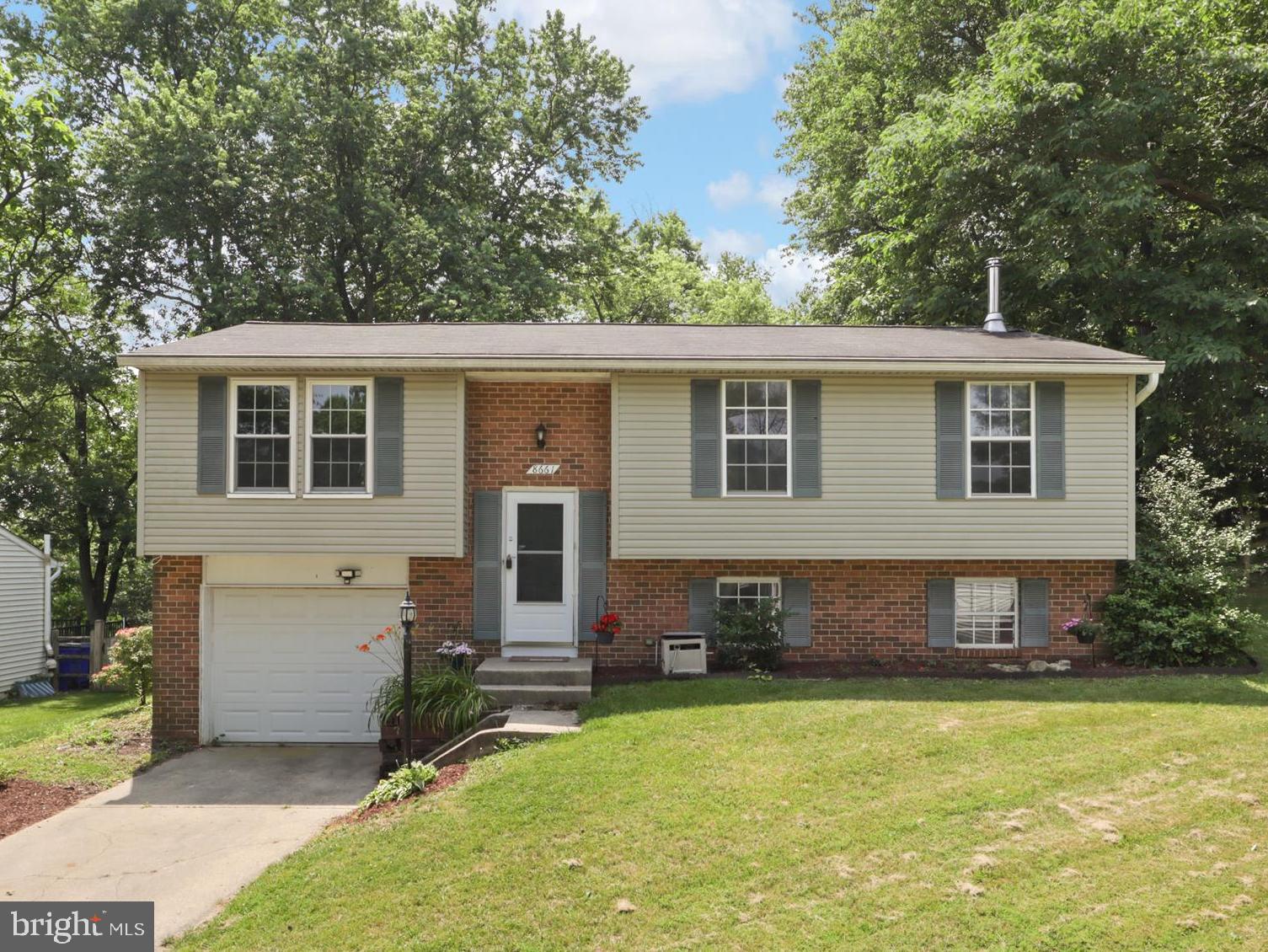 LOWEST PRICE DETACHED IN COLUMBIA and LARGEST YARD! Handyman at home? A few small touches will make this house shine! Kitchen and bathrooms already done! Located in the heart of Columbia on a cul-de-sac next to shaded tot lot, this attractive, remodeled split features a HUGE BACKYARD (2 really) and deck. Inside, the open and airy layout is beaming with light. Hardwood floors, a remodeled kitchen, and two remodeled bathrooms bring all the modern comforts. Walk out through sunny sliding glass doors to the large deck (18X12.) and big fenced yard beyond. On the lower level you'll find a generous rec room with brick fireplace, plus a large utility room with rough-in for a third bathroom, if desired, and access to the garage. The large backyard and privacy is truly one of the highlights of this delightful home. Recently refreshed with new paint, new flooring, new electrical fixtures, plus the totally remodeld bathrooms and updated kitchen, the home is ready for your finishing touches. The location offers wonderful privacy and is steps away from a charming tot lot at the end of the path. All the amenities of Columbia are at your fingertips including 95 miles of pathways, 10 village centers, and 3,600 acres of open space, Dedicated to building community, wellness and sustainability, Columbia has consistently ranked among the best places in th US to live and is focused on quality of life for its residents. You are in the heart of it here and can take advantage of 23 pools, tennis/pickleball, 3 fitness clubs, 2 golf clubs, a horse center, skate park, dog park and arts center. Pool and tennis membership is discounted for Columbia residents. A wonderful place to live!
