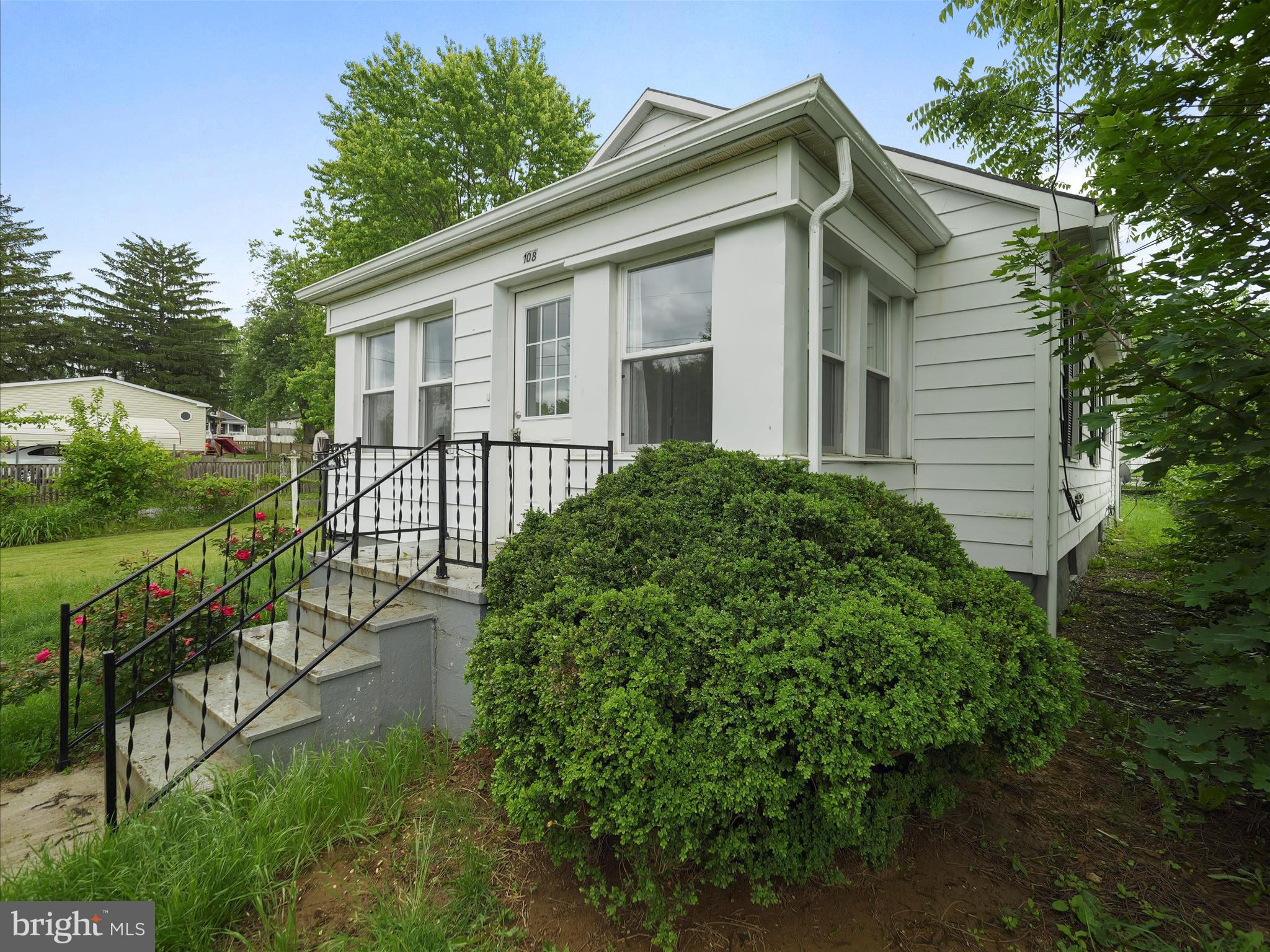 Welcome home to 108 E. 12th Ave! This charming 2 bedroom, 1 bath home is bigger then it looks! Front entry has lots of windows to let in the light. Kitchen is nicely updated with stainless appliances, white shaker cabinets and updated countertops. Family room off the kitchen gives added space to play or relax and opens to the rear covered patio. Full unfinished basement and walk up attic for plenty of storage. Professional photos coming soon!