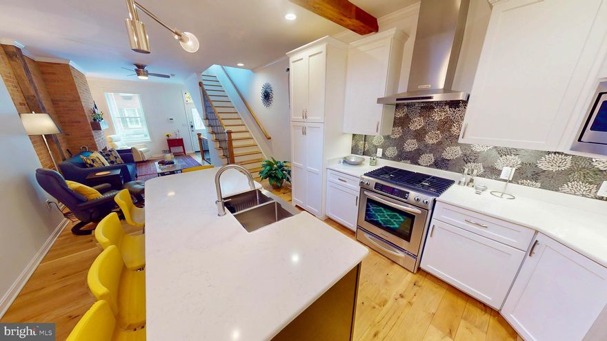 Rare Opportunity in Little Italy – Steps from Harbor East!
This one-of-a-kind, extra-large row home blends historic charm with luxurious modern upgrades in one of Baltimore’s most sought-after neighborhoods. Spread across three beautifully finished levels, this home features real hand-finished oak hardwood floors, exposed brick, and high-end finishes throughout.

The custom white kitchen is a showstopper with an oversized 8-foot island, gleaming quartz countertops, an exhaust hood over the range, and an oversized sink—perfect for entertaining or everyday living.

Boasting three full baths, two half baths, and three bedrooms with a potential fourth bedroom on the second level, this home offers maximum flexibility—including a main-level bedroom and a finished basement. A standout second-level wet bar opens up to a spacious private patio, creating an ideal indoor/outdoor flow for entertaining.  Over 2700 SQFT!

Dual-zoned with two HVAC systems, this home is as comfortable as it is elegant. Located steps from the incredible dining of Little Italy and Harbor East, and just minutes to Downtown, I-83, and I-95—this location truly has it all.

Don’t miss your chance to own a rare gem in one of Baltimore’s best locations!