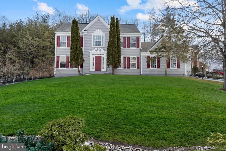 Welcome to your next chapter in the highly desirable Cardinal Crest community. This beautifully upgraded home truly has it all, and offers a rare location that sets it apart from others in the neighborhood. Situated on approximately 0.6 acres, the property is filled with natural light and provides a sense of privacy, openness, and extra breathing room that’s hard to find. Abundant nearby parking is an added bonus, making everyday living and entertaining guests effortless.

Step outside to the generously sized backyard deck, perfect for enjoying summer gatherings, relaxing evenings, or outdoor dining. Inside, you’ll find bright, elegant living spaces with upgrades throughout. The lower level features a full bath and three versatile bonus rooms, ideal for a private guest suite, home office, fitness room, or media room.

The main level offers a beautifully upgraded kitchen, dining room, family room, and living room, all flowing seamlessly and opening to the expansive deck. Upstairs, the upper level includes four bedrooms, two full baths, and a conveniently located laundry room.

Fully upgraded inside and out, this move-in-ready home is prepared for its new owner to simply unpack and begin the next chapter. Don’t miss this exceptional opportunity!