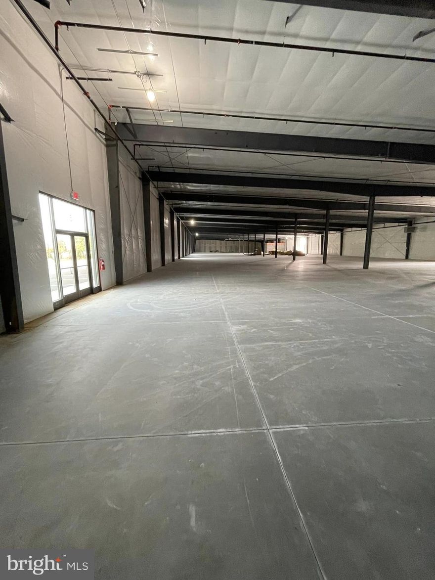 PRICE ESTIMATE for Cold Dark Shell - 331 Aviation Way is a Sprinklered Condominium Building with PRICE ESTIMATE for Cold Dark Shell - 331 Aviation Way is a Condominium Building with 55,002 SF.  
One Unit with 13,780 SF @ $14 + NNN ($3.20 PSF) Can Be Subdivided.
Restrooms are not installed as the owner is waiting to see where future tenant wants the location of it.
The Site totals 4.66 Acres and is Zoned M1 (Light Industrial) and located in the (AO) Airport Overlay Zone.  Located Across from Frederick Airport.