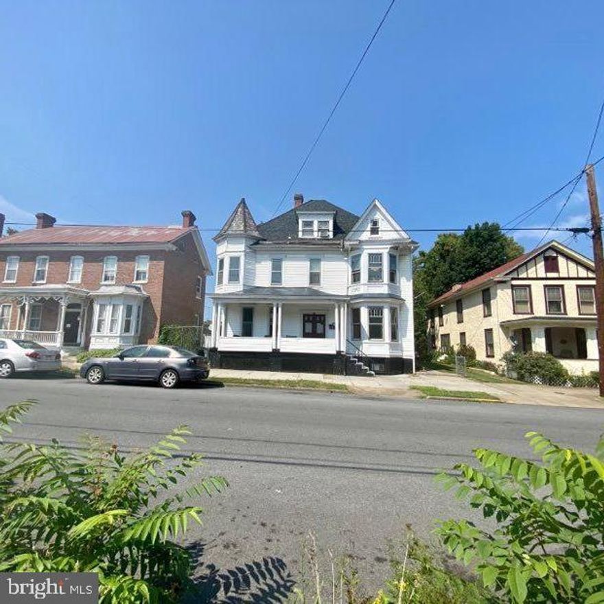 OFFER DEADLINE SET! There have been multiple offers received and a deadline to submit has been set for Friday, September 15th at 1pm. If you intend to submit an offer, please let me know as soon as possible. Thank you!

24 Hr. Notice required for tenants*

Welcome to an incredible investment opportunity in the heart of the downtown district! This historic multi-unit property, boasting four tenant-occupied rental units, is a gem waiting to be restored to its complete former glory. The property offers four rental units. There are three 1-bedroom units, perfect for professionals or couples, and a more spacious 2-bedroom unit. Located in a vibrant community, this property offers both charm and potential for savvy investors. Situated just a few short blocks from the bustling main street, this property enjoys easy access to the  downtown scene. Within walking distance, you'll find an array of dining options as well as the local theater. Not only is this area completely walkable, but commuters will appreciate the convenience of being within close proximity to the train station, making travel to nearby cities and beyond a breeze. The local University is just a 15-minute drive. The property retains its original charm, with hardwood floors and large front porch. The backyard area with ample shade cover can offer a tranquil escape for tenants to relax and unwind. This space could be transformed into a lush garden or an inviting communal area for all residents to enjoy. Since all four units are currently tenant-occupied, it can help ensure a steady rental income from day one. This makes it an excellent opportunity for investors looking for immediate returns. Whether you're looking to expand your real estate portfolio or start your investment journey, this property is a promising choice. Don't miss out on the chance to own a piece of this thriving downtown community and unlock the full potential of this charming multi-unit property. Embrace the opportunity to restore its former glory and capitalize on the exciting growth of the area. Contact me today to schedule a viewing and explore this remarkable investment prospect. Property being sold as-is.