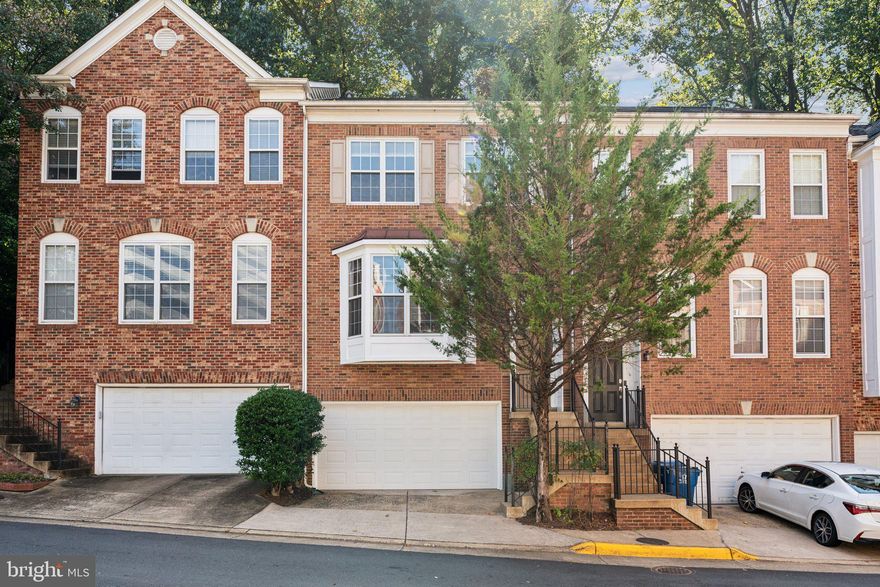 This delightful property boasts a prime location near Tysons Corner, I-495, local dining options, and Dulles Airport, offering exceptional convenience and accessibility. Inside, you'll find a welcoming and spacious home with three bedrooms, two full bathrooms, and two half bathrooms. The kitchen features modern appliances and a charming eat-in area, ideal for casual meals. The upper level houses three comfortable bedrooms and two full baths, providing plenty of space for relaxation and privacy. Behind the house is protected by tree covering giving a private feel not often found this close to everything.