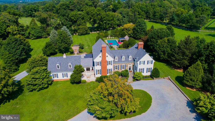 Stunning Colonial on 19+ prvt & well manicured acrs in the heart of Piedmont. 2 spring fed ponds, mature trees, Eng. grdens & breathtking mntain views surround this elegant home w/ historic touches.  Lrg open flr plan w/sun drenched rms, grmet kit, oak&heart pine flrs,high ceilings, mahog paneled library and exp brick FP's are stunning. Au-pair ste w/sep ent, pool & courtyard complete this oasis.