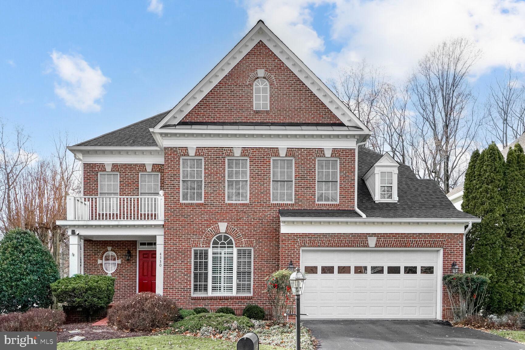 Discover this elegant brick colonial, four bedroom, three and one half bath home nestled in the heart of Fairfax City. Situated on a premium lot backing to a serene wooded common area, this home offers privacy and tranquility. Enjoy close proximity to George Mason University, the Fairfax County Judicial Center, and the vibrant shops and restaurants of Old Town Fairfax. The home has an inviting open floor plan with custom moldings, arched doorways, high ceilings, and hardwood floors throughout the main and second levels. The spacious gourmet kitchen, featuring granite countertops, cherry cabinetry, a wine refrigerator, double ovens, and a built-in microwave, is perfect for culinary enthusiasts. Cozy up by the gas fireplace in the adjacent family room. The luxurious master suite boasts a large soaking tub, shower, double vanities, two walk-in closets, and an abundance of natural light. The fully finished lower level offers a versatile studio area (new carpet for the studio coming soon), a recreation room, a full bathroom, and convenient walkout patio access. This well maintained home features fresh paint, plantation shutters, custom area rugs, and 9- and 10-foot ceilings throughout. The garage is an oversized two-car garage with a 240 volt outlet for an electric car charger. The grounds are landscaped and have an irrigation system.