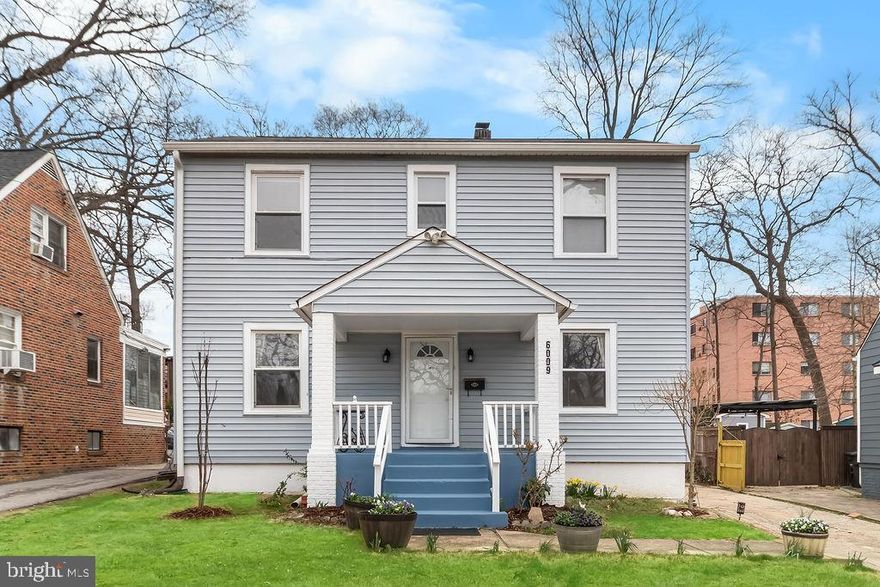 Upgraded Colonial style home with like new kitchen, with coffered ceiling, lots of cabinets, granite counter tops, stainless steel appliances, ceramic flooring. Original hardwood floors on main level, living room with wood burning fireplace. Nestled inside Hyattsville Hills, yet near shops, restaurants, metro stop. Minutes to DC and major arteries convenient to MD and Virginia commuters. Large fenced in rear lot with detached garage, deck and plenty of room to play. Large bathroom in upper level, convenient full bath on main level, plus a fully finished basement with kitchenette, guest bedroom and full bath with a private rear entrance. Sellers are offering a $2,500.00 carpet credit!