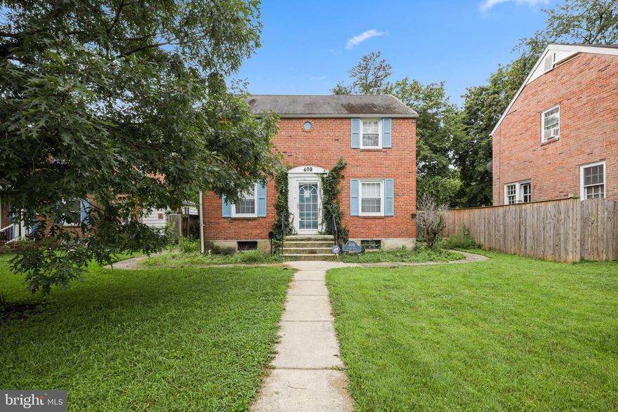 Solid brick Colonial  with 3-4 bedrooms and 2 baths in great Sudbrook Park location! Fantastic addition that could be a family room or 1st floor Primary bedroom. Windows and most exterior doors have been replaced. Fireplace converted to natural gas. Hardwood floors throughout. Full unfinished basement with 1/4 bath. Fully fenced in yard with shed. 
This house does need work but has a lot of potiential. Being sold  strictly "as is".
Any offers received will be reviewed by seller on Tuesday 9/7.