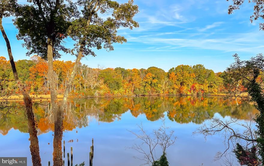 SPEND YOUR SUMMER HERE AND/OR EVERYDAY!!   WATERFRONT -   Completely Renovated Home  - New Roof, New Well, New Windows,  New HVAC, New Water Heater, New Attic Insulation, New doors, siding, and gutters, New Kitchen with stainless steel Appliances and  Quartz Countertops, View of the water from the kitchen, Dining, Primary Bedroom, back Covered Deck Area, New Bathrooms with porcelain, New paint throughout,  refinished hardwood floors, new paved driveway, new exterior steps to the waters edge and so much more.  Sit on the revamped back Deck/porch and enjoy the beautiful water view.  Partially finished basement leaves plenty of room to add your personal touches.   HOA is $10.00 a year.   You can purchase a separate  membership for the Community Pool!  This home is calling your name.  Act now and enjoy your summer there.