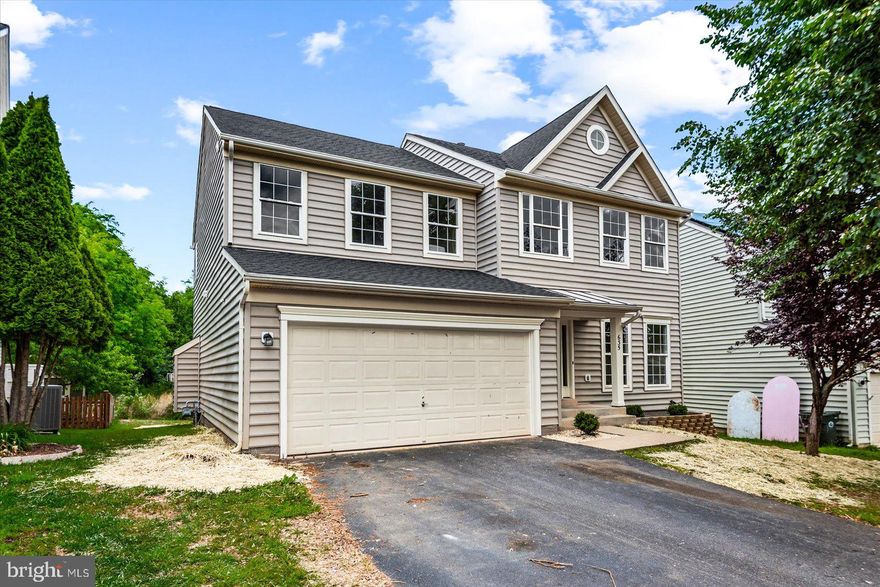 This beautifully updated colonial offers the perfect blend of modern finishes, functional living space, and timeless charm. From the moment you arrive, you’ll appreciate the inviting curb appeal, attached two-car garage, and spacious layout. Inside, the light-filled open floor plan features fresh paint, luxury flooring, recessed lighting, and a stunning kitchen complete with white cabinetry, quartz countertops, stainless steel appliances, wall ovens, and a large center island perfect for gathering. The kitchen opens seamlessly into the spacious den with a cozy fireplace, creating the ideal heart of the home. Upstairs, you’ll find four generously sized bedrooms, a beautifully remodeled hall bathroom, and an updated primary bathroom featuring stylish finishes and a gorgeous tiled walk-in shower. The fully finished basement adds even more versatile living space and features a common area, full bathroom, and two additional not-to-code bedrooms — ideal for guests, hobbies, office space, or multigenerational living needs. Located in the sought-after Lakeview of Culpeper community, where residents enjoy amenities including a community pool, clubhouse, playgrounds, walking trails, and scenic lake views throughout the neighborhood. Enjoy peaceful wooded views from the rear of the home while still being conveniently located near shopping, dining, commuter routes, and everyday conveniences. This move-in ready home truly offers the space, updates, and community features today’s buyers are looking for.