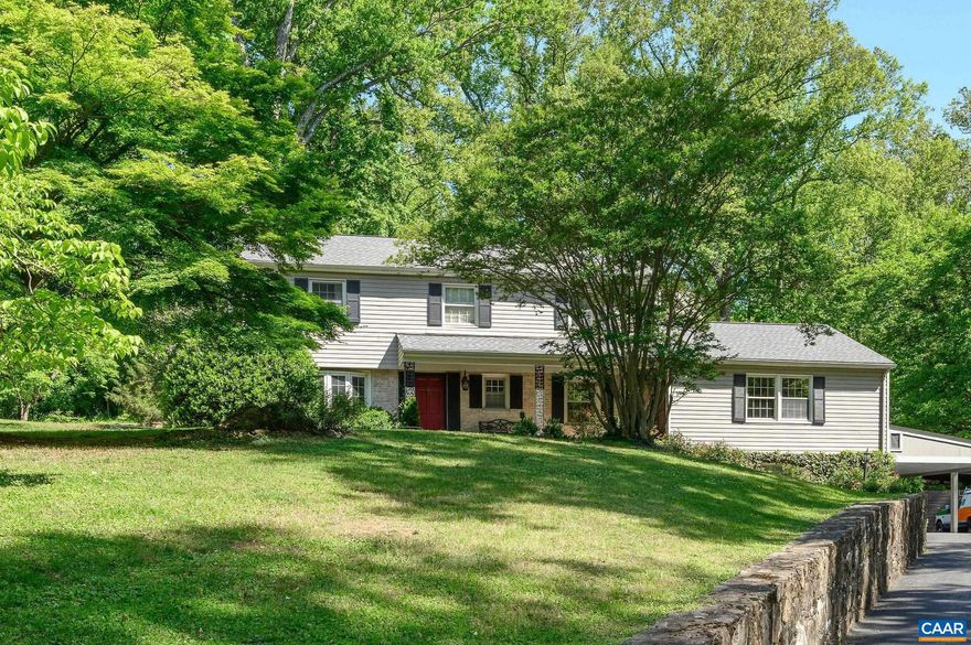 Amazing opportunity in THE MOST COVETED NEIGHBORHOOD.... BELLAIR.  21 Deer Path offers quick access to everything that makes living in Charlottesville so special. This home is filled w/ natural light, warmth and timeless Virginia charm.Large windows throughout the home invite sunlight into every room, creating bright and welcoming living spaces.Classic architectural details- such as paneled walls, coffered ceilings, rich wood floors from a barn in Virginia and traditional millwork -give the sense of character and craftsmanship.The gracious living room is particularly striking w/ beautiful custom green oil paint, and sunlit windows. With 5 bedrooms,3 full baths and 2 half baths, the home offers generous space for family and guests. The layout flows easily from room to room deisgned for everyday living and entertaining. The FINISHED BASEMENT w/ kitchenette bedroom and full bath makes the perfect space for an Au Pair or guests. Surrounded by mature trees and natural beauty, the property offers privacy, tranquility and the feeling of a classic Virginia Country retreat while having the conveniences of Boars Head Resort,UVA, Farmington, & Downtown Mall. Ivy school district, Foxhaven trails!!
