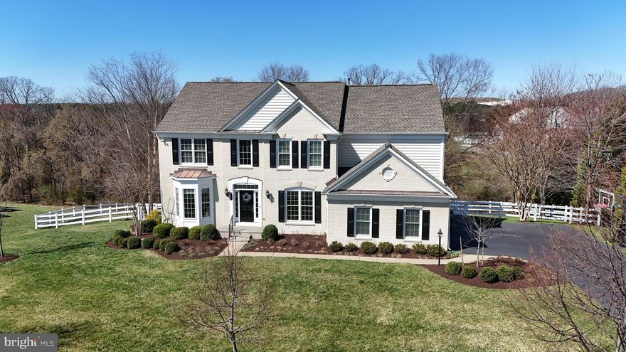 Welcome home to this exceptional 5-bedroom, 4½-bath executive residence situated on a beautifully landscaped and fully fenced premium ¾+ acre lot backing to serene woodlands in the sought-after Red Cedar neighborhood. This stunning property offers over 6,500 square feet of elegant living space across three impeccably finished levels.

Upon entering the main level, you are greeted by gleaming hardwood floors, an open floor plan ideal for entertaining, a sophisticated home office, and an impressive two-story family room featuring a cozy gas fireplace. The gourmet kitchen is a chef’s delight, showcasing high-end stainless steel appliances, including a brand-new GE Monogram refrigerator, abundant cabinetry, and a spacious breakfast area. Step outside from the kitchen onto a custom composite deck leading down to a gorgeous stone patio, enhanced by a charming stone sitting wall and overlooking the expansive, fenced backyard, complete with an 8-zone irrigation system covering both front and back yards.

The upper level offers four generously sized bedrooms, including a luxurious primary suite with vaulted ceilings, a comfortable sitting room, and a fully renovated spa-like bath boasting a frameless glass shower, stylish new vanities, and a spacious walk-in closet with a custom closet system and convenient laundry chute to the main-level laundry room. Two additional bedrooms share a Jack-and-Jill bath, while a fourth bedroom enjoys the privacy of its own en-suite bathroom.

The expansive lower level provides additional living space with a vast recreation room, a fifth bedroom, a full bath, a dedicated workout room, and ample storage.

Recent upgrades include a new roof (2019), water heater (2019), two HVAC units (2022), a furnace (2024), attic spray foam insulation and new carpeting (2023), ensuring comfort and efficiency for years to come.

Discover the lifestyle awaiting you in this magnificent Red Cedar home!