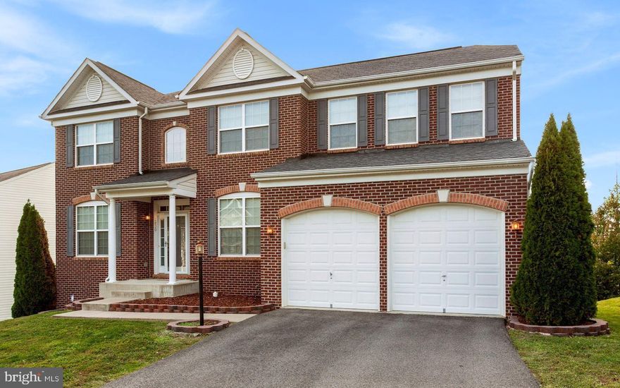 Welcome to this beautiful, extremely well maintained, brick 3 level home with 4 bedrooms, 3.5 baths, and 2 car attached garage! Over 4100 sq ft! This sought-after Delaware model features soaring ceiling heights in the family room, tons of natural light, fireplace, and the new wall mounted television is yours too!  Hardwood floors and new carpet throughout make this home move in ready!  Gourmet kitchen features beautiful new granite countertops, double wall ovens, center island with gas cooktop, extra-large pantry, and brand-new refrigerator and dishwasher!  Large deck right off the kitchen for easy grilling! Owners suite features vaulted ceilings, massive walk-in closet, bathroom with double vanity, soaking tub, and separate shower.    Main level offers a separate office for all your virtual meetings, school, and working/learning needs! Finished walkout basement with full bathroom, space for a legal 5th bedroom, and ample storage. Custom blinds throughout home have a lifetime warranty. Bedroom level laundry room.   Eagles Pointe HOA includes swimming pool, tots lots, tennis courts & a clubhouse with fitness center and event room for parties. Only 3 miles to Stonebridge with Wegmans, retail stores like REI and Apple, delicious restaurants like Uncle Julios, Firebirds, and BurgerFi, and more! Perfect location for commuters! Less than a mile to Route 1, close to I-95 and 234. Easy access to multiple commuter lots, bus, VRE station, HOV lanes, Quantico, Ft Belvoir, Pentagon and AMAZON HQ2! Welcome Home!