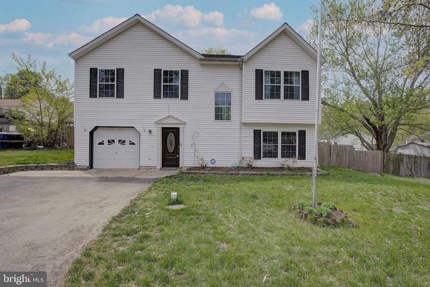 A true 4 bedroom home with 2 full bathrooms, a renovated kitchen with new appliances/backsplash/sink and countertops. This home also has new light fixtures, a tiled laundry room with newer washer/dryer, large fully fenced yard, newly painted deck, stone patio, firepit area AND a garage with interior access. Roof was put on in 2020 and driveway was also newly refinished during this time. This home would be a perfect choice for a starter home, rental investment or one to add your personal touches too. Short walking distance to bus stops that will take you highly rated schools within the County. Come see if this is the home you have been looking for!