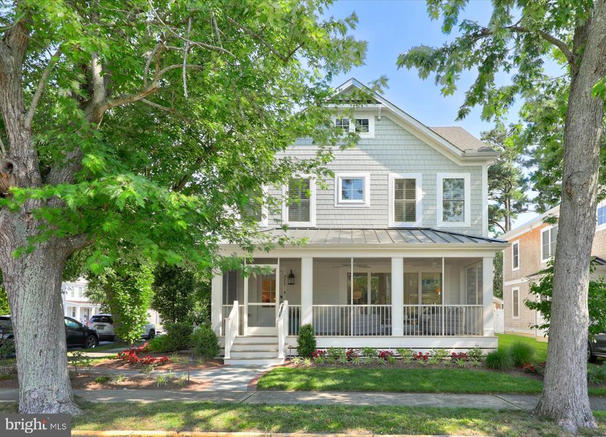 Come see this South Rehoboth beauty situated on a gorgeous tree-lined street featuring Beach Chic living with 5 bedrooms and 4.5 baths. This stunning home was built in 2018, but looks pristine and will be sold completely furnished down to the linens, kitchen items and all things needed for beach goers. Entertain graciously with the open floor plan and beyond by simply sliding the front porch doors open for additional seating.  Your family and guests will love the proximity to the beach and they will have their choice of a first or second floor master or one of the other 3 guestrooms.  A rarity in Rehoboth Beach;  this home features a single car garage plus an additional off-street parking space. Many additional thoughtful upgrades and special touches were made by these sellers including a fenced in backyard. The generous basement is perfect for extra storage or perhaps a home gym. Drive by in the evening to take in the elegant outdoor lighting.
More details to follow.