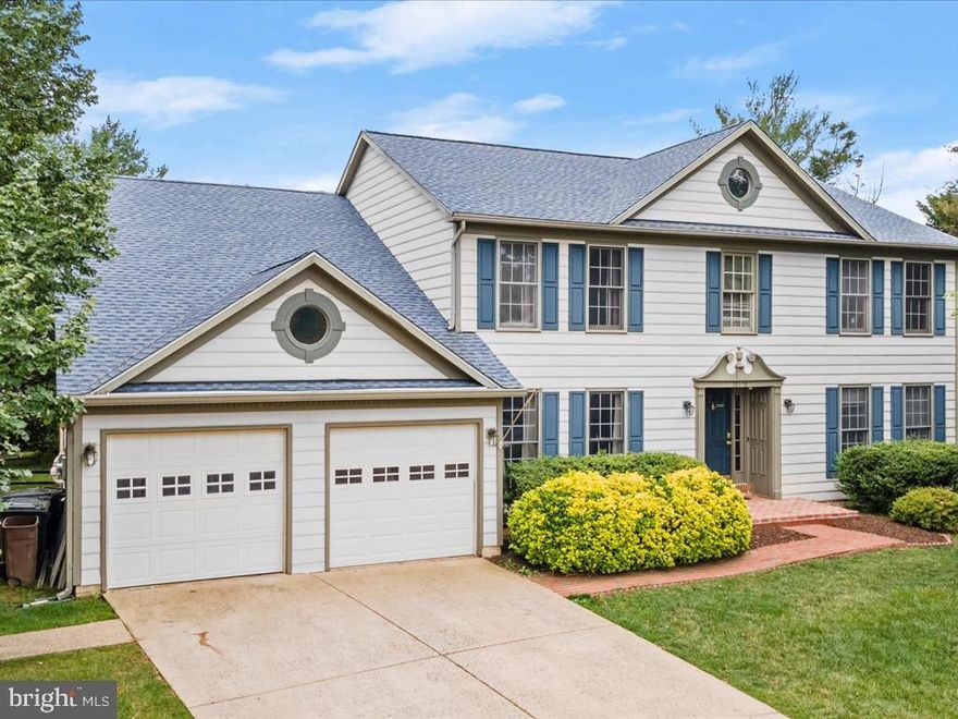 One of THE LARGEST homes in the community!  And it feels like it, as soon as you step inside the soaring foyer and leave your bags, shoes and worries at the door, before deciding where to spread out next.  Rooms for everything and everyone - working, study, play, crafts, entertaining, music, gym - this home provides it all. 
What is the seller's  most favorite feature?  All the space, she said.  Well that, and getting to everything she needs in nearby Manassas in just minutes - especially Paris Baguette.  
The separate dining room is as oversized, as it is elegant.  Convenient little butler's pantry begs for a coffee bar (or other kind of bar), as an afterthought to the kitchen.  Speaking of the kitchen , it's beautiful and just waiting for you to bring it to life with the sounds and smells that make memories, like Saturday morning breakfast.  Casual Breakfast area filled with sunlight from the bay window is great for a quick snack or lunch. 
All within earshot of the grand Family Room - start your gaze on the fireplace and keep looking up.  A bonus that comes with the house is what I'm calling a parent protection shield - it's really just mesh across the railing on the walkway overlooking the family room, to help prevent the unexpected impact of a lego, stuffed animal or toy car from above.  But really, this gathering place is absolutely stunning and spacious, yet still your guests and closest friends can spill out onto the deck for laughs and storytelling well into the evening.  
The other perks of this level are the powder room, and bright but cozy room with built in bookcases that you can focus, work or craft in the peace and quiet behind closed doors.  It's this owners most favorite room!  The main level still offers a front formal living room, and extra large laundry and mud room near the garage entry. 
Heading upstairs, there are so many bedrooms and every one has a bathroom!  Well two of the bedrooms share a jack-n-jill double vanity and bath time room.  Third bedroom has its own bathroom, great for guests. They all leave you alone to your Master Suite - once again cathedral ceilings add to the space, the closet is more like a dressing room, and the bath has a soaking tub, separate shower and extra long dual vanity.    
On days when you just want to retreat to the cooler lower level, it offers almost as much.  A perfect room for guests, or dimly lit office, right across from another full bathroom.  There is another official bedroom as well, that walks right out to the back yard through a glass sliding door.  The main event is your choice - game day or movie night with the projector and screen?  Just add a popcorn machine.  Or room for the most rowdy play dates.  
We just have to touch briefly on the storage though - the perfect amount of unfinished space for one of the largest water heaters you will see in a home (its even commercial grade so no worries about filling that soaking tub in the Master), updated HVAC and all your boxes, gym, decorations, you name it.  
Pompom isn't just fun to say when you order things, it could be your source of pride to come home to!