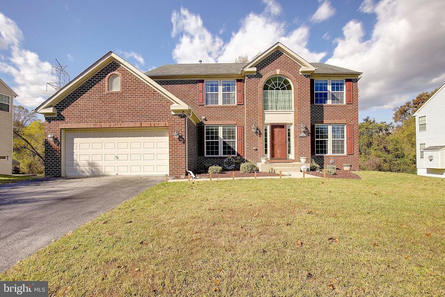 Imagine coming home to this beautifully maintained Colonial detached home tucked away on a quiet cul-de-sac, offering privacy, space, and luxury throughout. This home shows exceptionally well with a neutral pallet and recessed lighting throughout, boasting five spacious bedrooms, four full bathrooms, and one-half bath, with a two-car garage and thoughtful design for both everyday living and entertaining.  Step inside to find an inviting two-story foyer that opens to a formal living room and dining room, perfect for gatherings and special occasions. The main level office provides the ideal space for working from home.  At the heart of the home, is a chef’s kitchen featuring a massive nine-foot island, abundant cabinetry, and premium appliances. The morning room with its striking Palladian windows fills the space with natural light and offers scenic views of mature trees. The family room is warm and inviting with a gas fireplace and floor-to-ceiling windows, creating a seamless connection to the outdoors. Upstairs, the primary suite is a true retreat with a sitting area, a luxurious ensuite bath featuring a corner soaking tub, dual sinks, ceramic tile flooring, and a separate two-plus-person shower. A secondary bedroom enjoys its own private bath, while three additional bedrooms share a well-appointed hall bathroom. The walkout basement expands your living space with a large recreation area, bonus room that can serve as a sixth bedroom or home office, and a dedicated media room complete with elevated theater seating and a movie projector that conveys. Outside, enjoy a beautifully landscaped rear yard, a storage shed, and a peaceful cul-de-sac location. This home blends timeless style with modern convenience — a perfect fit for those seeking comfort, function, and elegance in one exceptional property. You can't let this remarkable blessing get away.