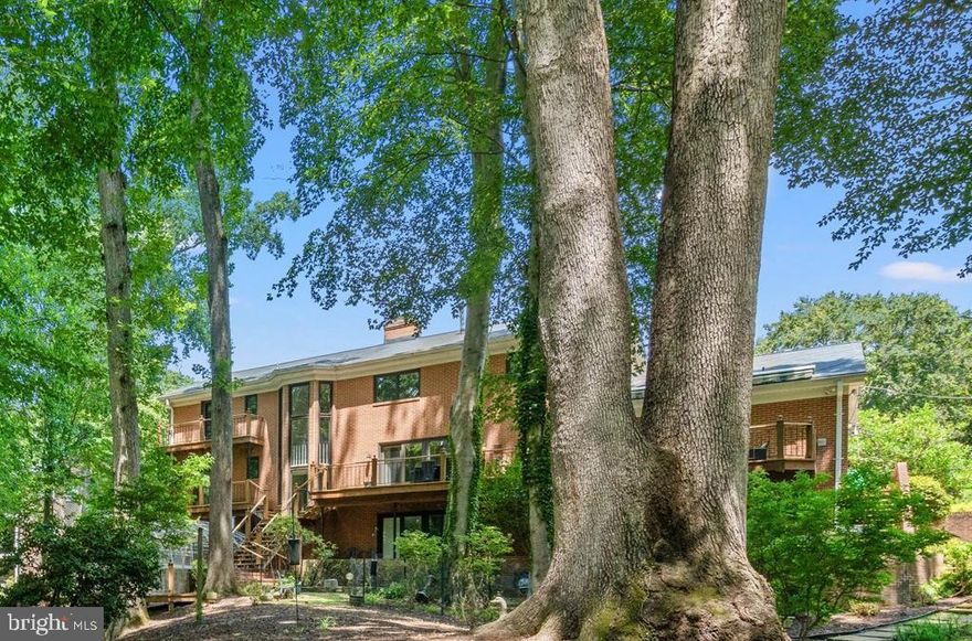 Welcome to 12213 Firth of Tae Drive, a stately residence in the sought-after community of Tantallon on the Potomac. Spanning nearly 5,400 square feet of refined living space, this home offers an elegant blend of timeless architecture, modern updates, and serene water views—complete with a dock. From its grand porte cochere to its finely crafted finishes, every detail reflects sophistication and enduring style.

Step inside and be greeted by a graceful staircase framed by floor-to-ceiling windows that flood the foyer with natural light—an impressive welcome for all who enter. The flowing layout perfectly balances formal entertaining and everyday comfort. Real hardwood, marble, and tile floors enhance the home’s luxurious character throughout.

The main level offers a beautifully appointed formal dining room with a picturesque window, a stylish bar, and a statement accent wall. The front gathering room provides an inviting space for refined entertaining, while the family room—with its cozy fireplace and expansive windows—flows seamlessly into the outdoors. The eat-in kitchen, overlooking the landscaped front yard, includes a butler’s pantry and a separate mudroom for added convenience. Step outside to the expansive deck with a retractable awning—ideal for alfresco dining, summer gatherings, and weekend cookouts. The circular driveway and two-car garage offer impressive parking capacity for up to 20 cars.

Upstairs, the primary suite is a private retreat featuring a remodeled marble-appointed bath, dual vanities, a walk-in closet, a custom wardrobe, and a private balcony overlooking tranquil views. A second ensuite bedroom with an updated bath offers comfort for guests, while three additional spacious bedrooms and another updated bath complete the upper level.

The fully finished walk-out basement expands the living space with a large recreation room, fireplace, wet bar, sixth bedroom, fourth full bath, and flex room. Step through the Pella patio doors to your private backyard oasis—featuring a greenhouse and access to the shared dock (right side conveys), perfect for boating, kayaking, or relaxing by the water.

Life in Tantallon offers a true sense of community—neighbors stroll, cycle, and enjoy the outdoors. Nearby marinas, the National Golf Club, and Fort Washington Park provide endless recreation, while National Harbor and MGM are just minutes away. With easy access to D.C. and Northern Virginia—or by boat to The Wharf, Georgetown, and Old Town Alexandria—this location embodies the ultimate in convenience and luxury living.

Experience the perfect balance of elegance, comfort, and waterfront living—schedule your private tour today. *Square footage is approximate and should not be used for property valuation.