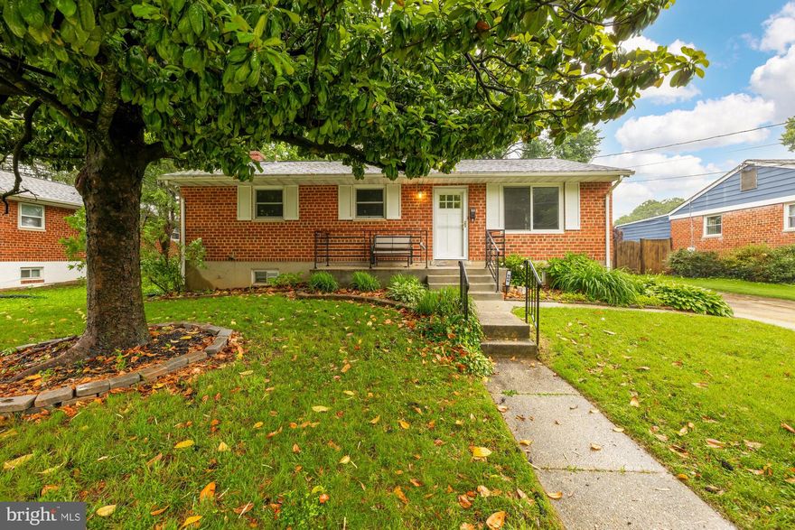 Price improvement! Welcome to 909 Snure Road—a beautifully renovated 4-bedroom, 2-bath rambler ideally located just steps from Sligo Creek Park and offering easy access to the Beltway, two Metro stations, downtown Silver Spring, and Takoma Park. From the inviting expanded front porch, step into a warm and welcoming living room with rich hardwood floors that continue through to a spacious dining area. The recently updated kitchen is a true showpiece, featuring custom blue cabinetry, quartz countertops, classic subway tile backsplash, luxury vinyl flooring, and a smart, Wi-Fi-enabled appliance suite—perfect for any home chef. The sunroom is a great bonus space and allows for easy access to the backyard. The next owners could add a mini split for four season use.

Enjoy seamless indoor-outdoor living with a large, private back patio and built-in vertical flower beds—ideal for relaxing or entertaining. The main level offers three generously sized bedrooms and a fully renovated hall bath. The finished lower level expands your living space with a large recreation room, a fourth bedroom—perfect as a home office or guest suite—and a second full bathroom.

Thoughtfully maintained and upgraded, this home includes a new roof (2017), all-new Andersen windows on the main floor (2021), and HVAC system improvements (2023). Don’t miss this turnkey gem in a prime location with a perfect blend of comfort, style, and convenience.
