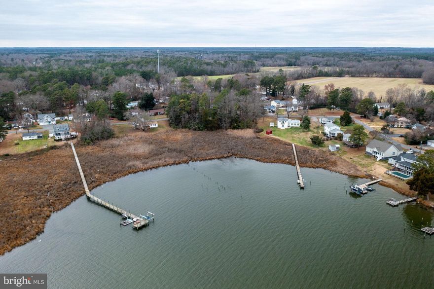 Great lot for your waterfront dream home in a lovely golf cart neighborhood.    This lot is situated in a quiet cove across from the Point.    Enjoy serene views of the bay and local water birds.  Build a dock or lease a slip on the community pier.  Walking distance to the private, sandy community beach that you can access by joining the voluntary civic association for around 150 per year.  Lot 10 is also for sale and seller will consider 250k for both.  Use 1058 Shore Dr to get gps directions.  Lots are just to the left of that address.      Stakes next the house market the boundry of lot 9.  You can walk up that side and look at the view Both lots have been confirmed with the county to have  paid sewer connections which is a significant savings!  We have even had a local builder evaluate the site and propose a home that is suitable for the lot so it's easy for you.
Cant wait to own your dream home? Buy the land and fund construction in a single, stress-free closing.