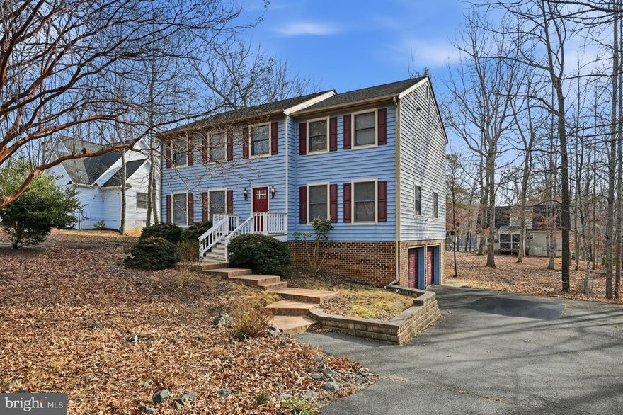 Come enjoy spacious living in this traditional Colonial home featuring over 3000 square feet, 4 bedrooms, and 3.5 baths. The home includes an oversized two-car garage, a finished terrace level, a screened porch, a deck, and a level backyard area.
The large, light-filled living room (15x25) offers abundant windows on all sides and a cozy wood-burning fireplace with beautiful arched brick detailing. There is easy access to the back deck from both the kitchen and living room.
The kitchen features a breakfast area, pantry, stainless steel appliances, and wood cabinets. Hardwood floors flow throughout, beginning in the foyer with a coat closet and continuing into the spacious formal dining room.
The generous primary suite includes a nursery or reading nook, a large walk-in closet, and a bath with double vanities. Two additional spacious guest bedrooms are located upstairs, along with a guest bathroom featuring double vanities.
The finished terrace level offers a walk-out and includes a family room or fourth bedroom, a full bath, storage area, and security room. Additional features include a whole-house fan, wiring for a generator and security system, Andersen windows, two 220-amp services with full-house surge protection, and a French drainage system.
Must see! Fireplace located in the living room.