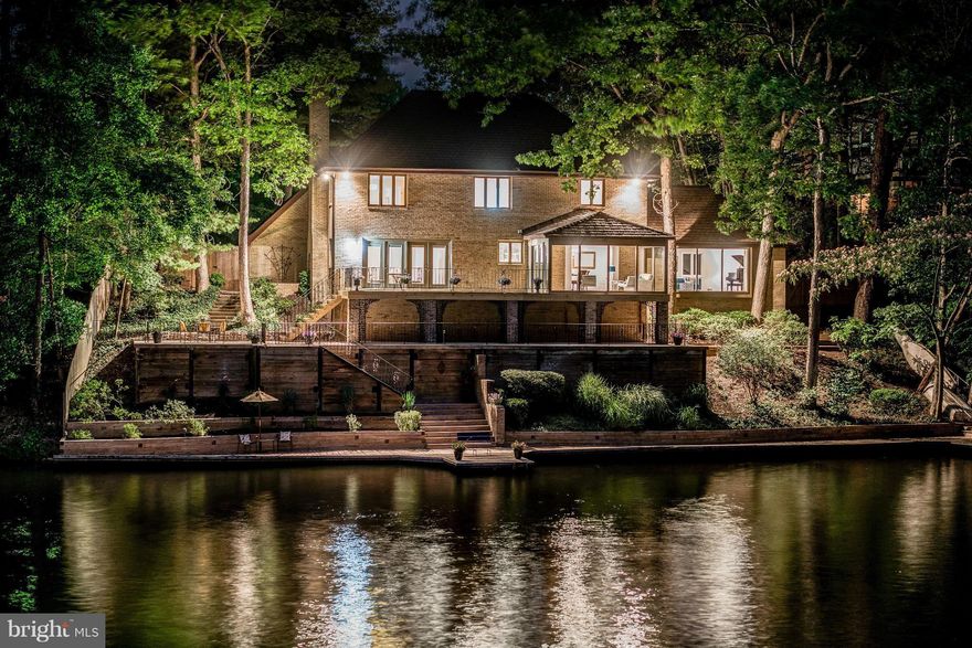 Have you've ever wanted a peaceful, lakeside life? Well, now you can have the life of your dreams. Custom, updated French Provincial home boasts lake views from nearly every room. Expansive outdoor decks & patios for entertaining. Dock provides space to moor a pontoon &  store kayaks/canoes. Many updates including kitchen & baths & wood flooring. Located on a quite cul-de-sac. Just 8 miles to DC.