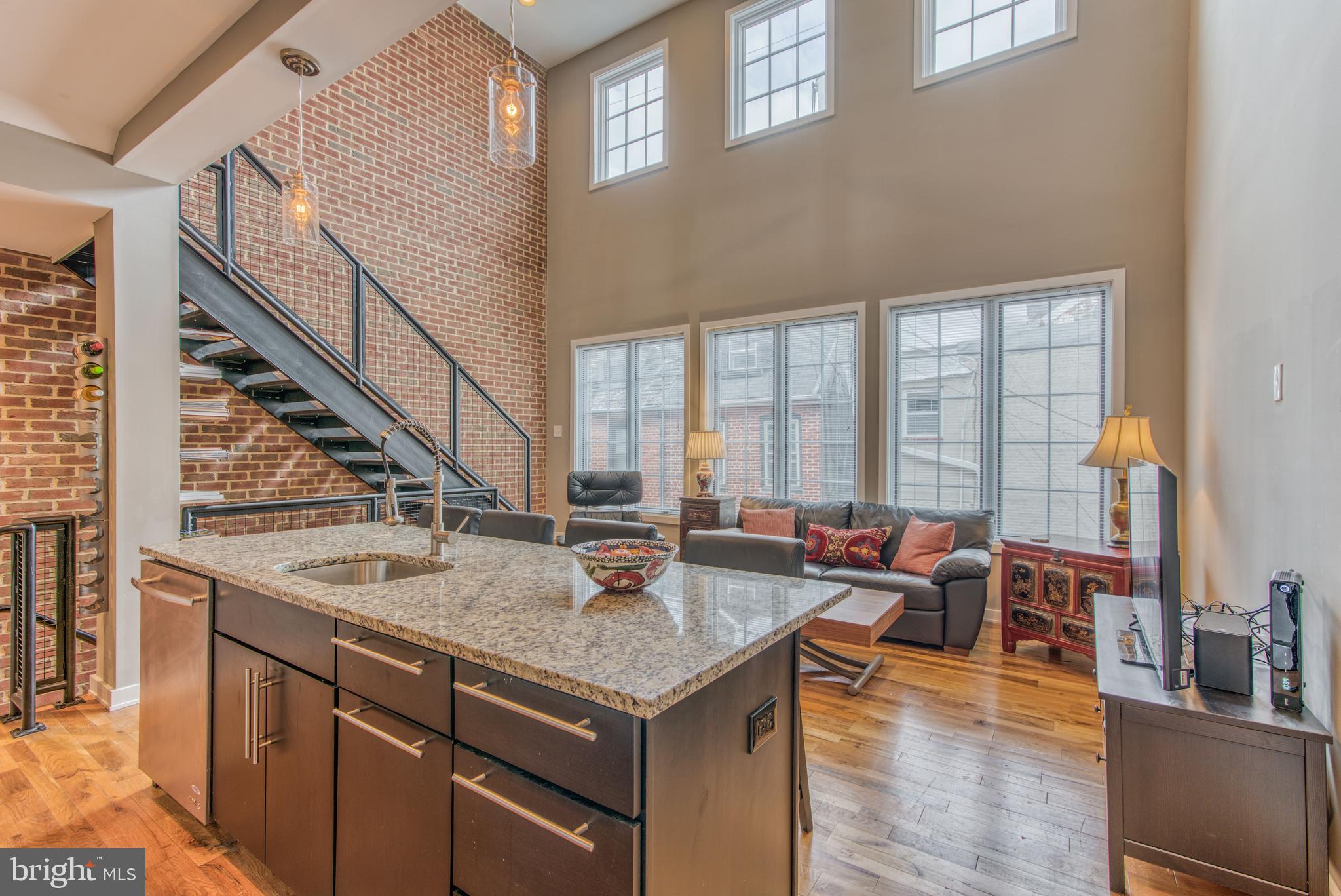 Fells Point -Blocks to the water-Capitalize on historically low interest rates! Beautifully constructed 2 car garage loft style townhome in Fells Point- blocks to the water- High ceilings- open concept- Convenient location- High end features- instant hot water- Full roof top terrace- Open tread stairs- Wood floors- 6 burner stove- Tons of storage- private alley in rear- VERY LOW energy bills- owned solar- Tesla charging in garage- Close to tons of dining establishments. Between Harbor East and Canton-Roughly 2000 square feet. Brand new Whole Foods just opened-