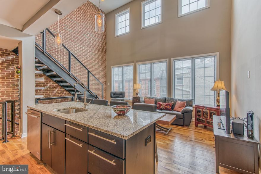 Fells Point -Blocks to the water-Capitalize on historically low interest rates! Beautifully constructed 2 car garage loft style townhome in Fells Point- blocks to the water- High ceilings- open concept- Convenient location- High end features- instant hot water- Full roof top terrace- Open tread stairs- Wood floors- 6 burner stove- Tons of storage- private alley in rear-  VERY LOW energy bills- owned solar- Tesla charging in garage- Close to tons of dining establishments. Between Harbor East and Canton-Roughly 2000 square feet. Brand new Whole Foods just opened-