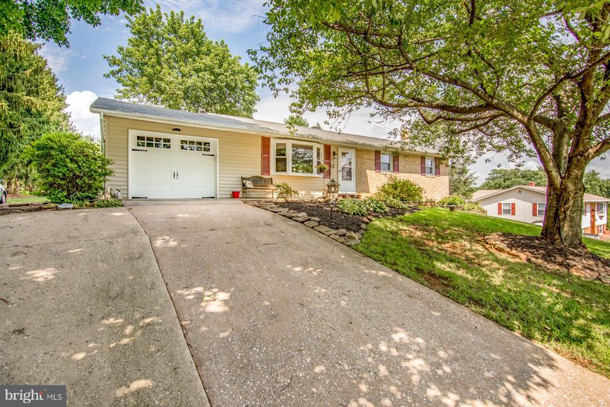 This home screams pride in ownership! Golden hdwds throughout main level. Giant gourmet kitchen w/ ss appliances and new granite tops. 3 sizable beds w/ large mstr & 2 fully updated baths on main level. Finished bsmnt w/ poker area, second LR, mud rm, half bath, wood stove & walk out to an amazing yard. Including upper level deck, lower patio & custom tiki bar. The perfect place to make memories!