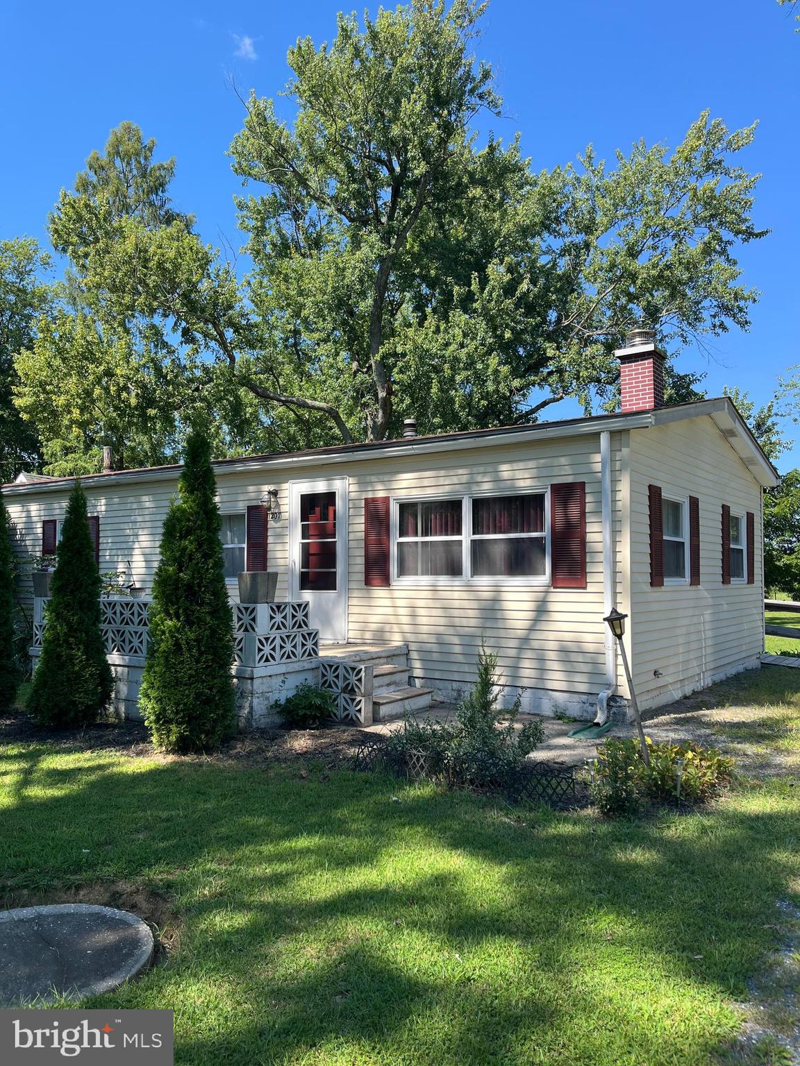 Great starter home close to Bel Air, half acre level lot, surrounded by large shade trees and 2 sheds. Large parking area for numerous cars or space for a garage. 50' X 21', Manufactured rancher, 1000 sq.ft. on permanent concrete block foundation with 30' X 8', concrete rear porch, covered with metal roof, ideal for summer evenings watching kids and pets playing in the level, open back yard. Recent improvements include, roof 2020, oil furnace in 2021, all flooring, carpet and LVP 2025, well pump (2025), hot water heater 2025, front storm door 2025.