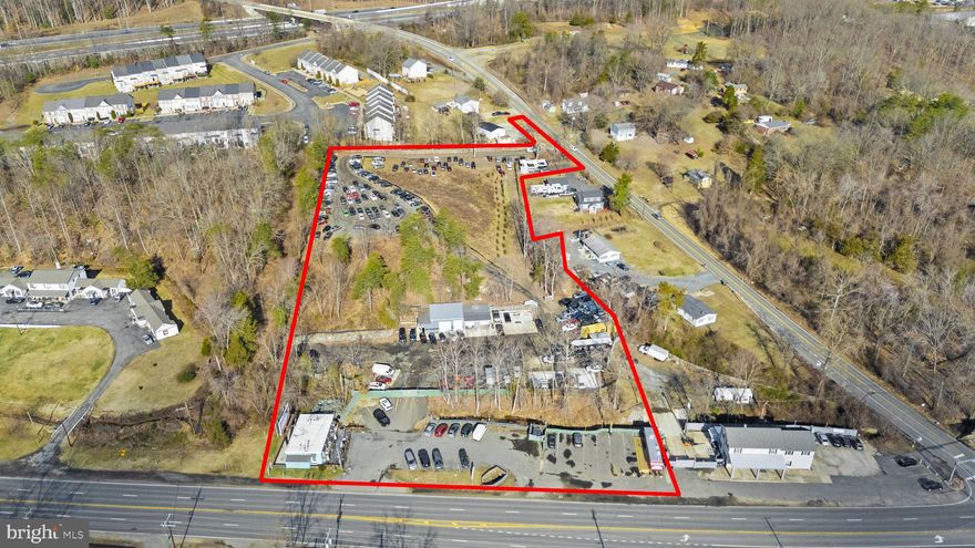 FOR SALE:  PRIME INCOME-PRODUCING COMMERCIAL INVESTMENT OPPORTUNITY - 4.2+ Acres near intersection of Richmond Highway & Telegraph Road in Stafford, VA

An exceptional investment opportunity located in one of Virginia’s fastest-growing counties. This 4.2+ acre income-producing commercial property features dual frontage and access along two key roadways: 325’ ± along Richmond Highway (Route 1) and 185’ ± along Telegraph Road (Route 637). The site includes a mix of income-producing structures, high-visibility signage, and long-term value-add potential through redevelopment or repositioning.

The property is zoned B-2, Urban Commercial (4.06 Acres) and R-1, Residential (0.19 Acres).  According to a third-party report, the restaurant is a use that is permitted by right and the billboard is a lawfully non-conforming use.  Vehicle storage is allowed with a conditional use permit that was approved on January 24, 2017, Application CUP16151094.

Investment Highlights:  $18K+/month Income Generating Property, High-Traffic Frontage on Route 1 – a major north-south commercial corridor, Dual Access Points enhance usability and traffic flow, Public utilities available.

Current Leases Include:  Peet’s Coffee & Tea Coffee Shop - 1,092 SF restaurant building with paved parking, Rusito Café – A food trailer lease, Clear Channel Outdoor Signage – Long-term lease with global advertising company, Multiple Tenants leasing the secure parking lot for vehicle parking, including a 2,230 SF ± mechanic shop, Each tenant manages their own utility bills, including water, sewer, electricity, and trash. The landlord pays for insurance and real estate taxes. 

The site is level at the front and slopes upward toward the rear, providing potential for creative site planning or phased development. The desirable location benefits from access and visibility on both roads, located just south of the Quantico Corporate Center, a growing business hub. 

The 2024 Tax Assessment is $1,635,200.

Location & Market Dynamics:  Stafford County, Virginia is strategically located along the I-95 corridor, 40 miles south of Washington, D.C. and 55 miles north of Richmond. This position between two capital cities makes it a prime location for commercial investment. With public infrastructure in place, excellent transportation connectivity, and a pro-business environment, Stafford County continues to attract employers, residents, and investors.

Summary:  This offering represents a rare opportunity to acquire a strategically located, income-producing commercial property in a high-growth market with strong economic fundamentals, increasing property values, and continued demand for commercial space.  

This sale is subject to the approval of the US Bankruptcy Court, Eastern District of Virginia, Alexandria Division.   The hearing to approve the pending sale is scheduled for June 17, 2025 @ 11am.  Please contact the LA for a copy of the Sale Notice, Motion and proposed Sale Order for further details.