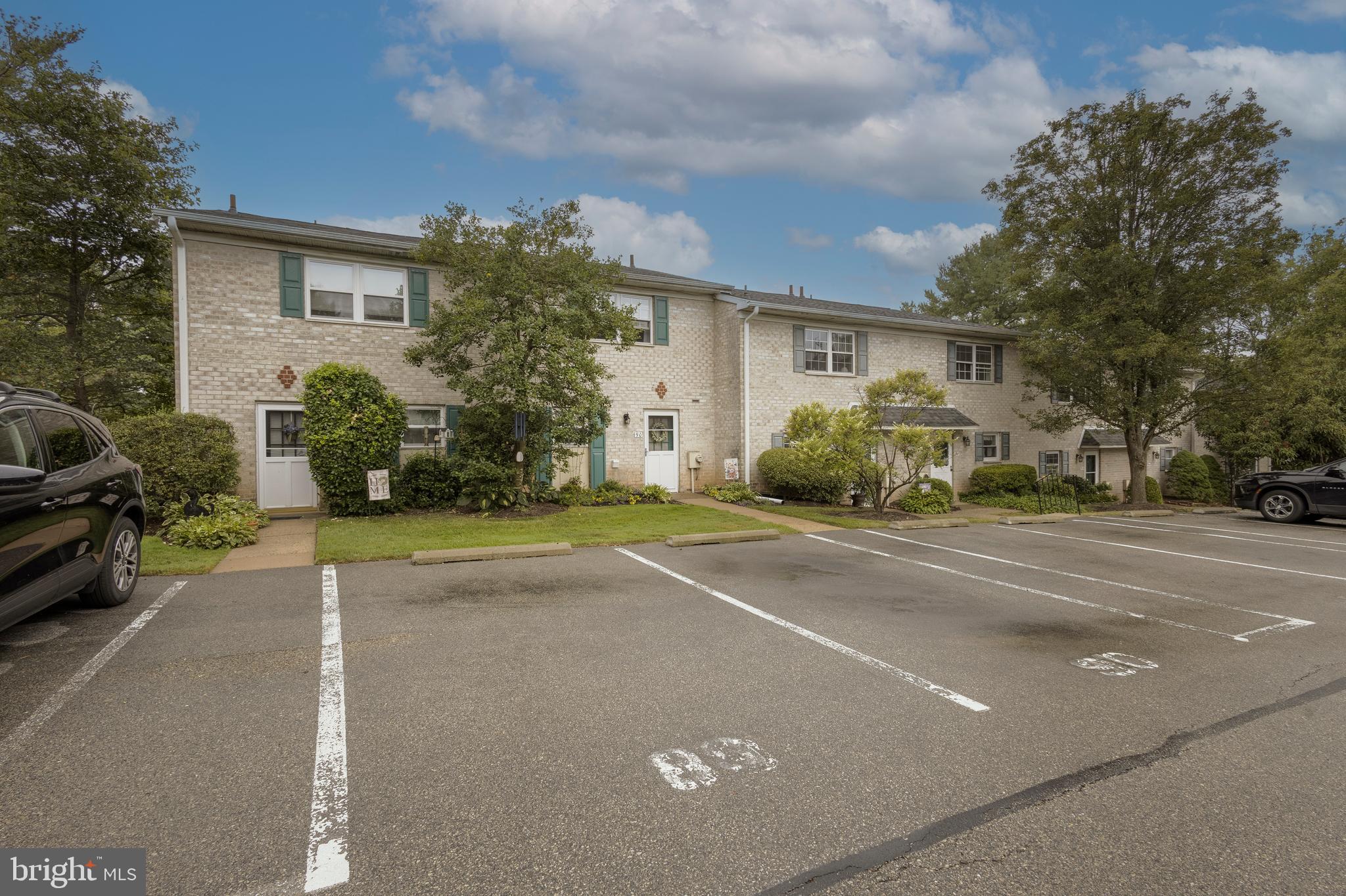 Nestled in the highly desired Butler Park Condominium community, this 2 bedroom 2.5 bath home is awaiting its lucky new owner(s). This two- story condo offers comfort, space and style and has been lovingly maintained over the last 38 years. The main level features a spacious combination living and dining area along with a renovated eat in kitchen (2019) that boasts modern finishes and plenty of natural light. With its quartz countertops, white tile backsplash, tile floor, white shaker style soft close cabinetry and stainless steel appliances, this kitchen is a chef's delight. Completing the 1st floor is the utility closet, storage closet and powder room that was updated in 2023 to include new vanity, mirror, commode and lighting. Step through the sliding glass door to a rear patio with newer fencing (2021) for additional privacy. Upstairs you will find two generously sized bedrooms, including a primary suite with an updated en-suite bath and walk in closet. Updated in 2017, the primary bath has a beautiful step in tile shower with niche, new vanity, mirror, commode and flooring. Another full bath can be found in the hall right outside the 2nd bedroom. Double closets and an abundance of natural light makes this bedroom a peaceful oasis. The newer plush carpeting was installed in 2023 and can be found throughout the entire home. Few more updates include newer water heater (2019), freshly painted throughout in neutral colors and the roof was replaced in either 2018 or 2019 by the association. The home includes 2 parking spaces as well as additional parking for guests. Within walking distance to downtown Ambler, this location is unbeatable with all its eateries, shops, parks and attractions. Easy access to all major routes of transportation including the PA Turnpike, 309 and the train station which is only a mile away. Highly ranked Upper Dublin School District. This lovely home is ideal for first time homebuyers, downsizers or anyone seeking low maintenance living. Schedule your appointment today and get ready to experience the best of Ambler living.